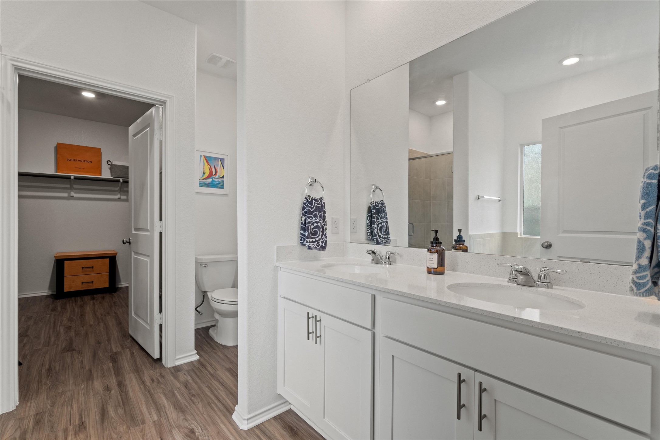 424 Wolf Springs Road Georgetown, TX 78628 - Photo 17 of 37 a bathroom with a double vanity sink and a mirror