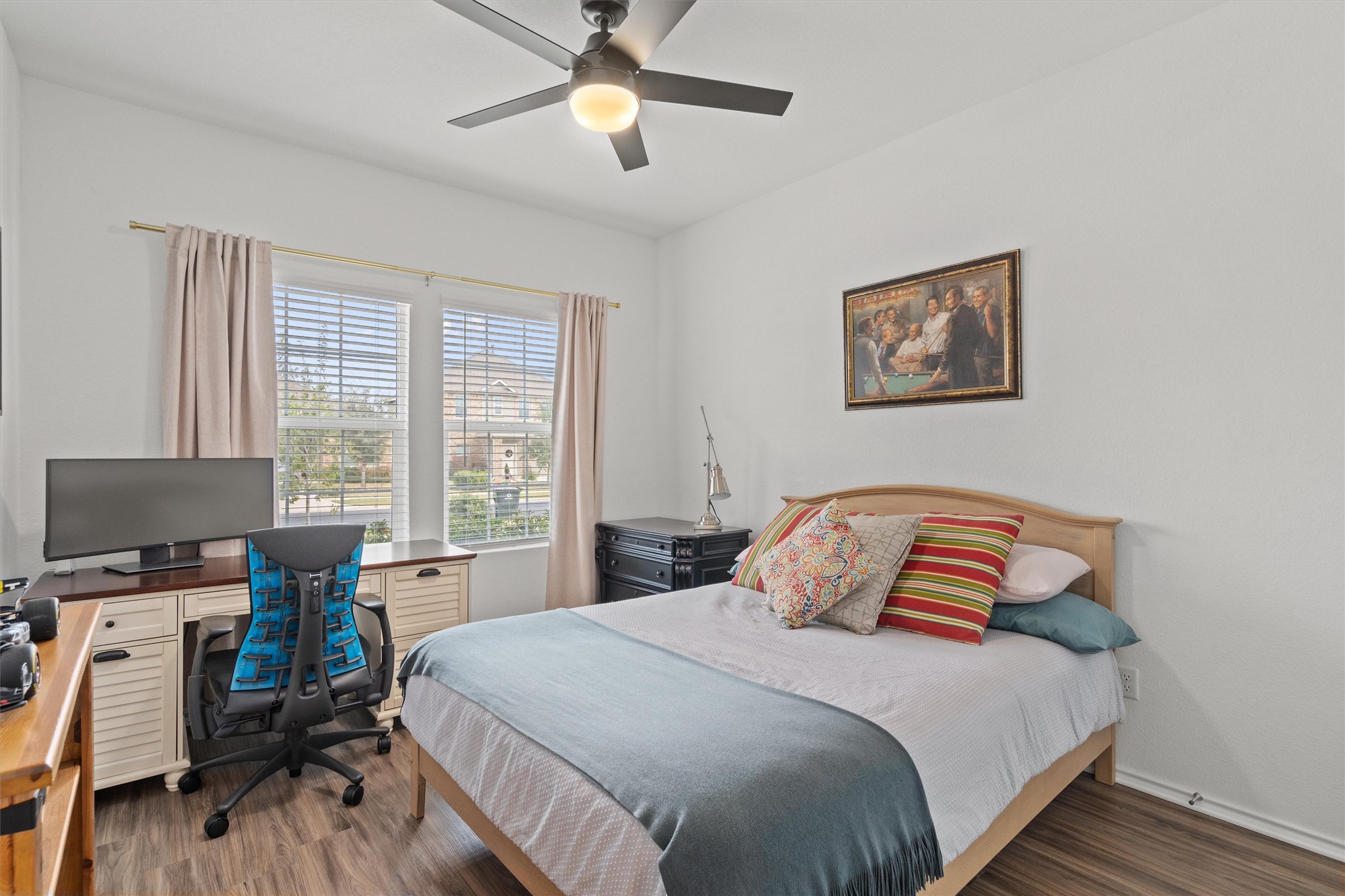 424 Wolf Springs Road Georgetown, TX 78628 - Photo 20 of 37 a bedroom with a bed and a window