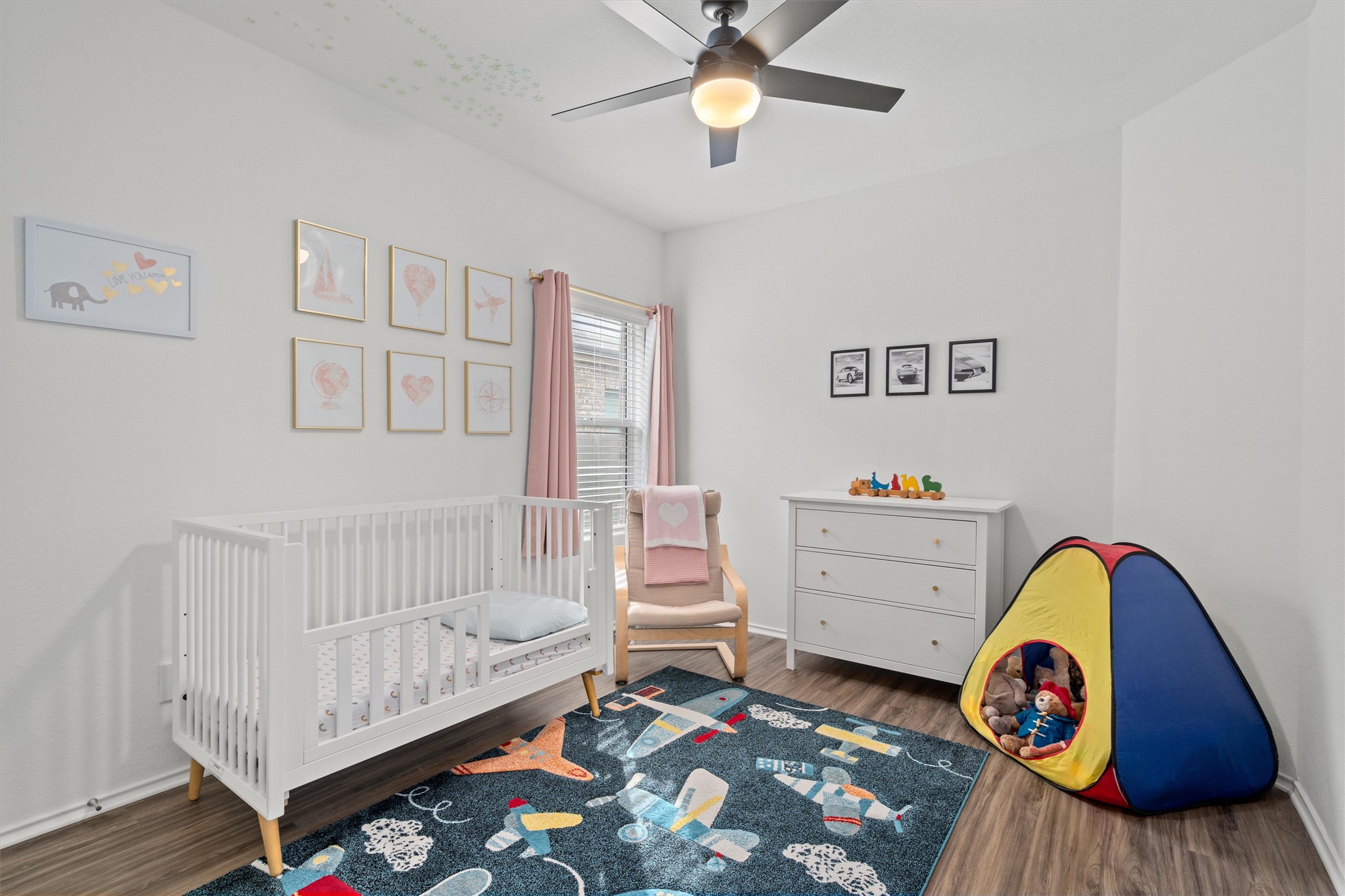424 Wolf Springs Road Georgetown, TX 78628 - Photo 22 of 37 a bedroom with a bed and a dresser