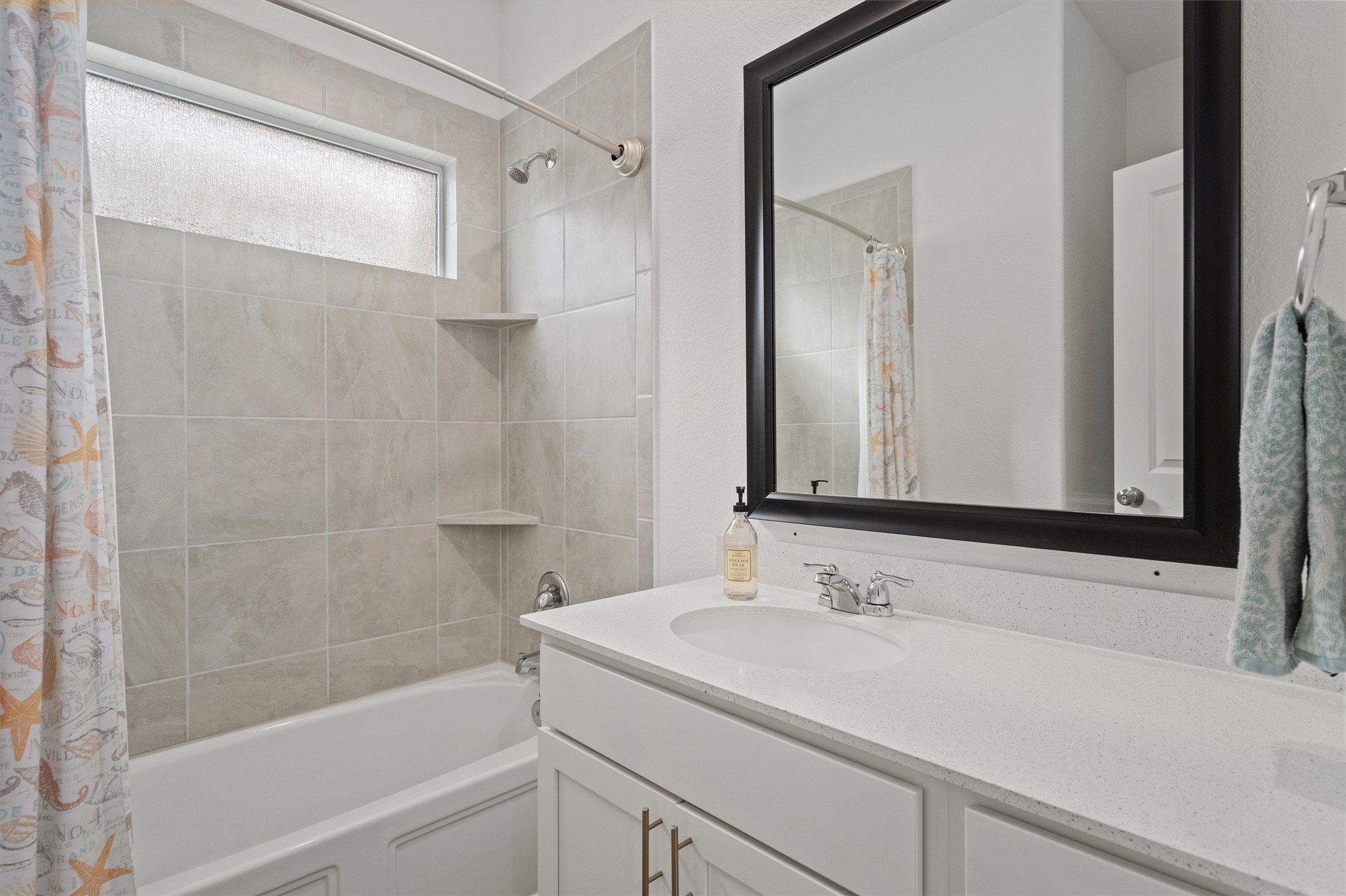 424 Wolf Springs Road Georgetown, TX 78628 - Photo 23 of 35 a bathroom with a sink and a mirror