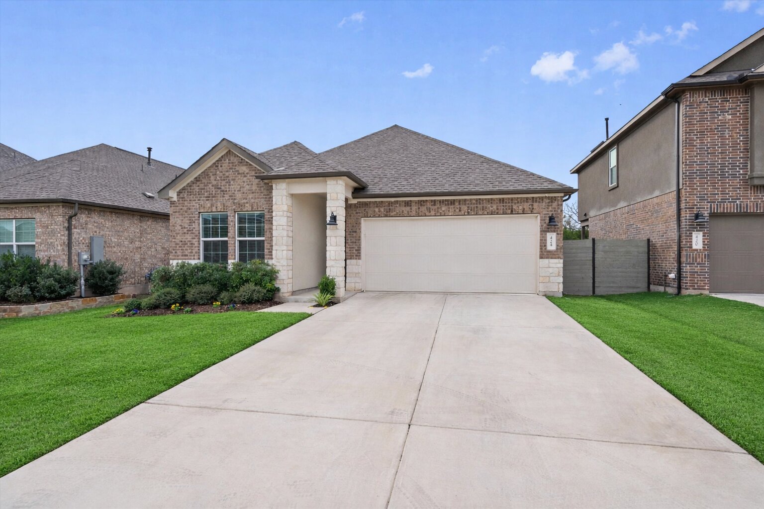 424 Wolf Springs Road Georgetown, TX 78628 - Photo 28 of 37 a front view of a house with a yard and garage