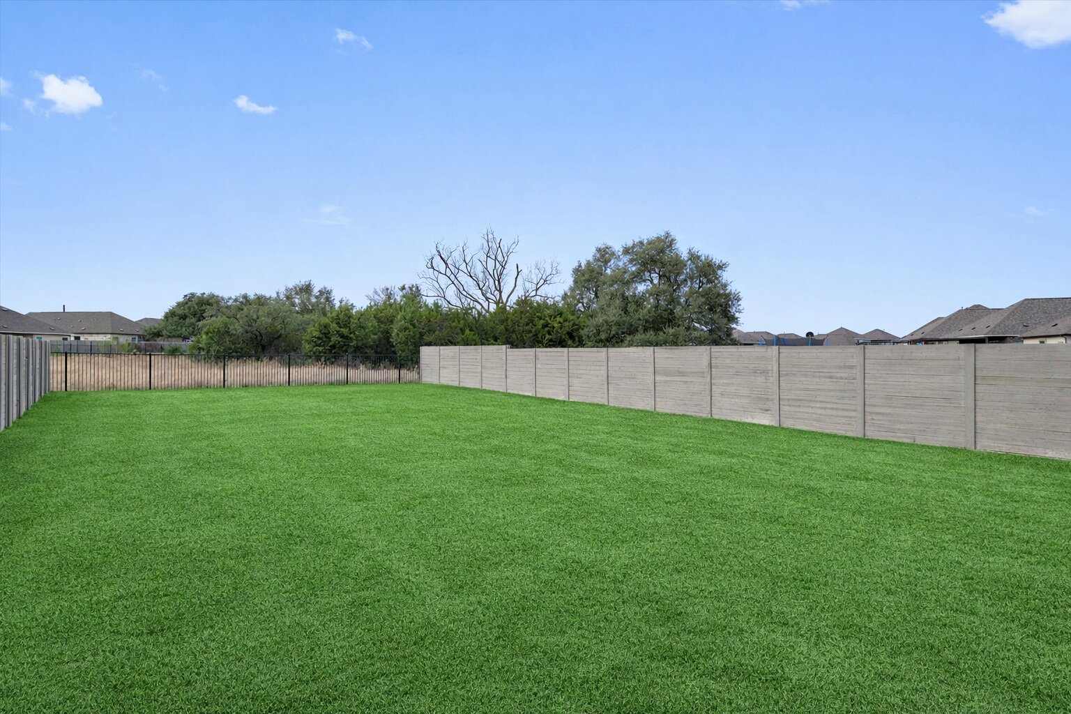 424 Wolf Springs Road Georgetown, TX 78628 - Photo 31 of 37 a view of yard with grass and trees