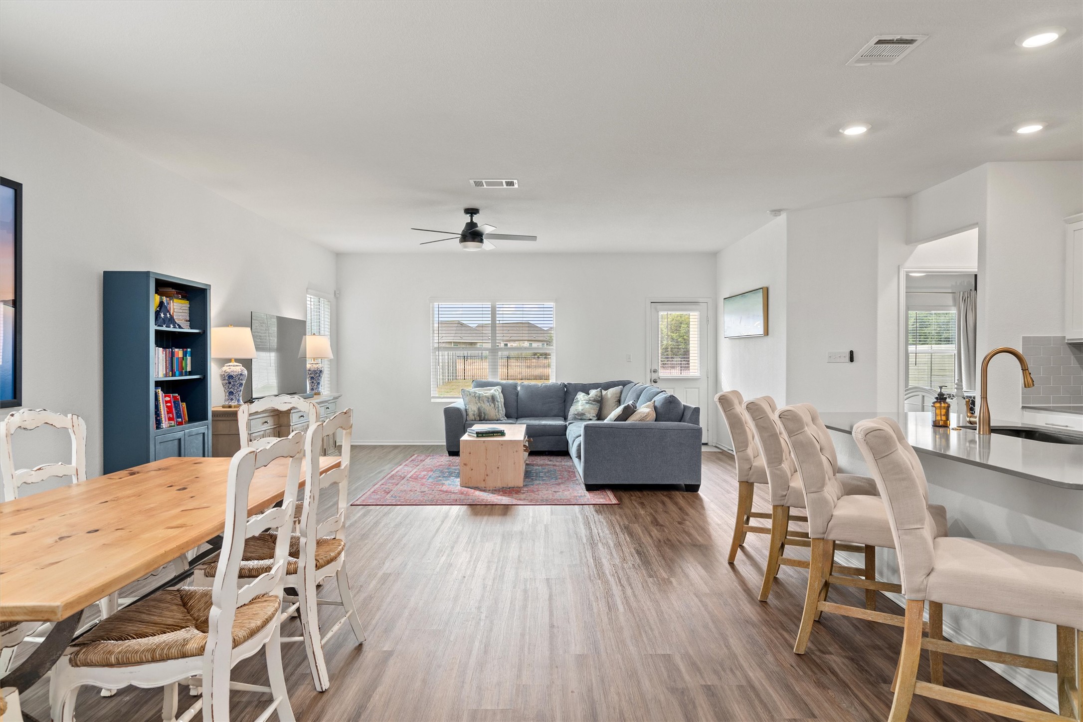 424 Wolf Springs Road Georgetown, TX 78628 - Photo 5 of 35 a living room with furniture and a wooden floor