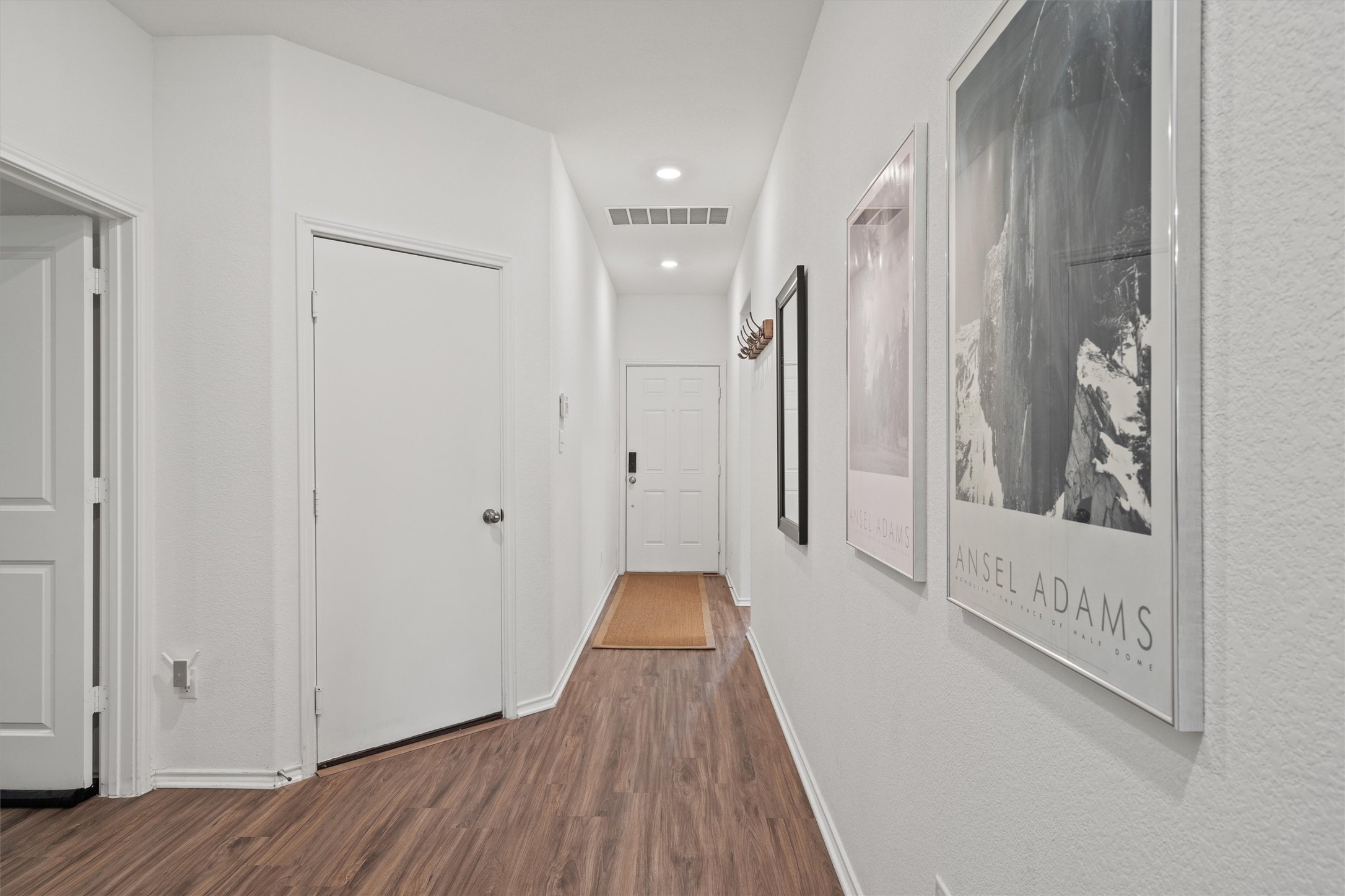424 Wolf Springs Road Georgetown, TX 78628 - Photo 7 of 37 a view of hallway with wooden floor