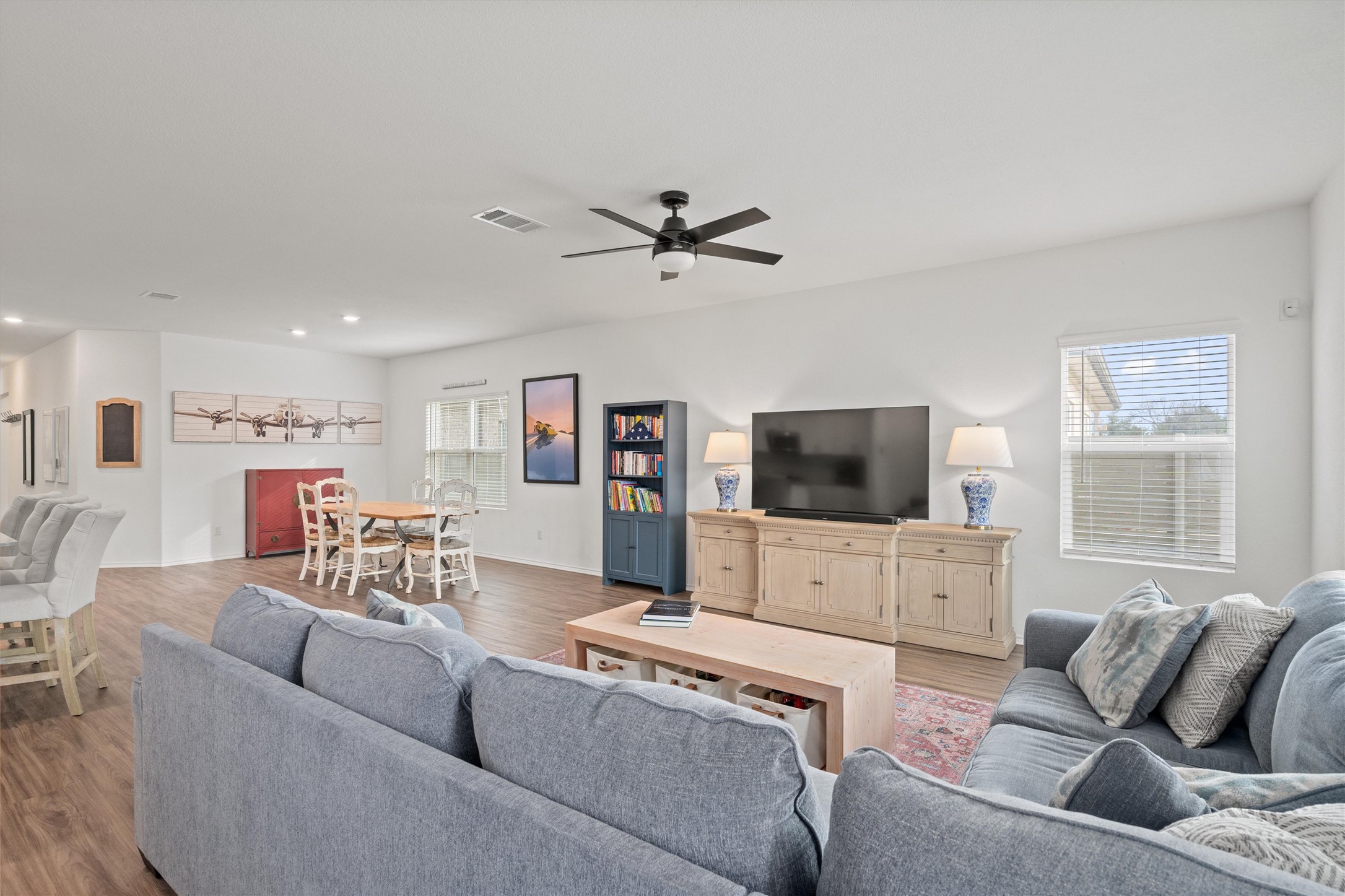 424 Wolf Springs Road Georgetown, TX 78628 - Photo 10 of 35 a living room with furniture and a flat screen tv