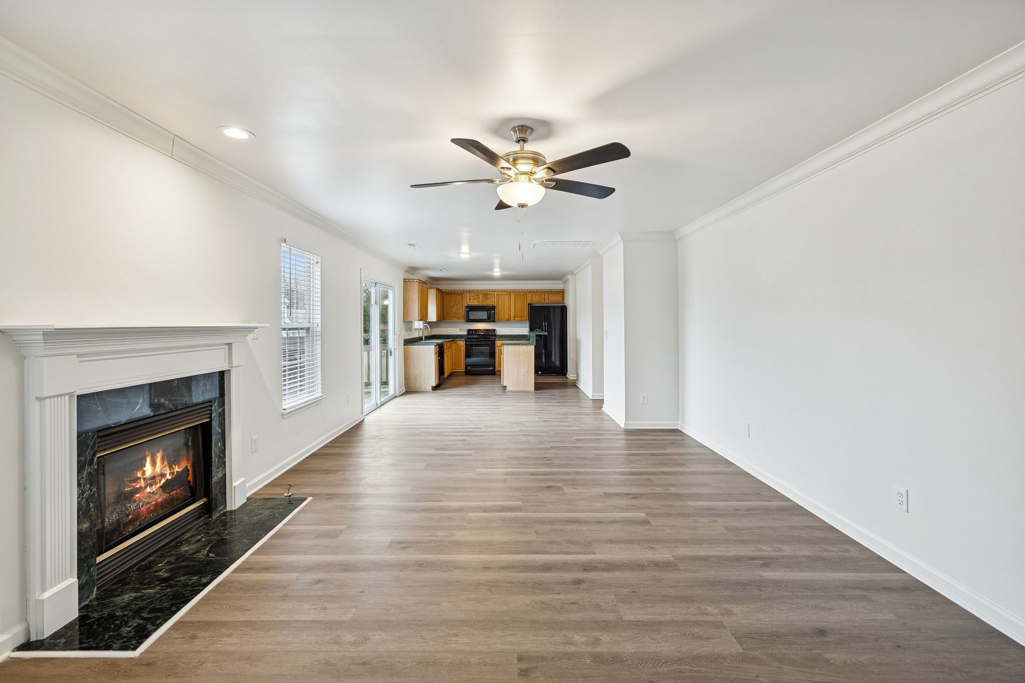 1849 Devon Drive Spring Hill, TN 37174 - Photo 16 of 58 a view of an empty room with fire place and a fireplace