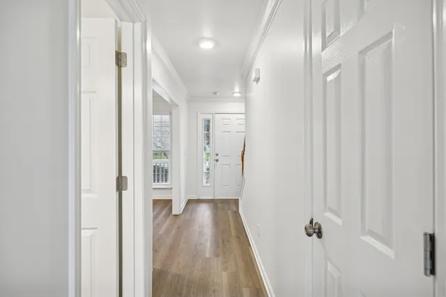 a view of a yard with a house in the background