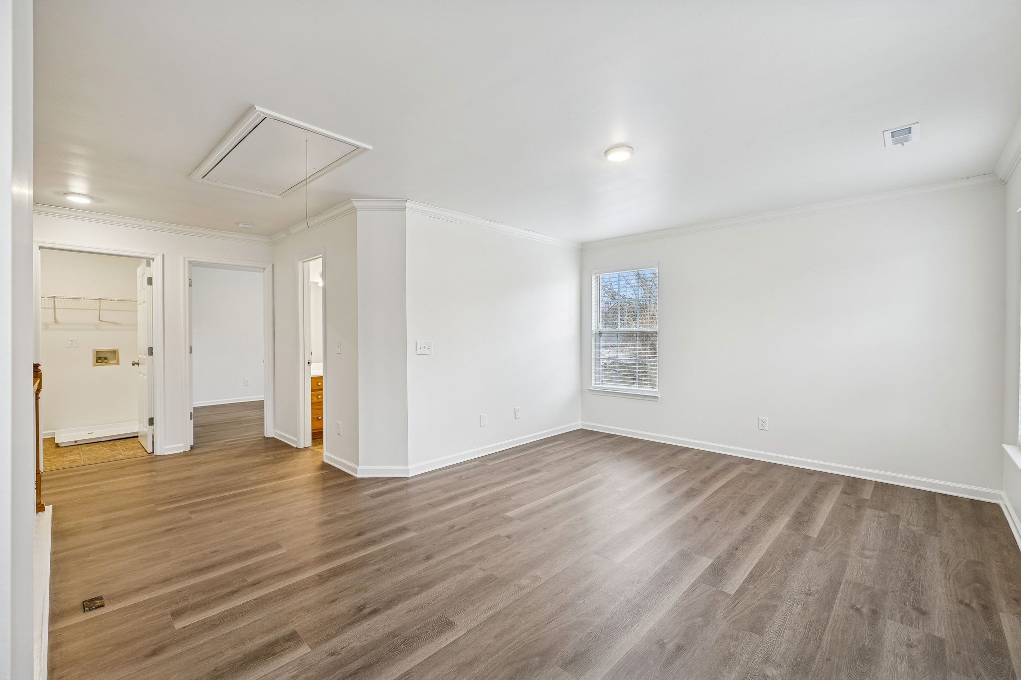 1849 Devon Drive Spring Hill, TN 37174 - Photo 33 of 58 a view of an empty room with wooden floor and a window