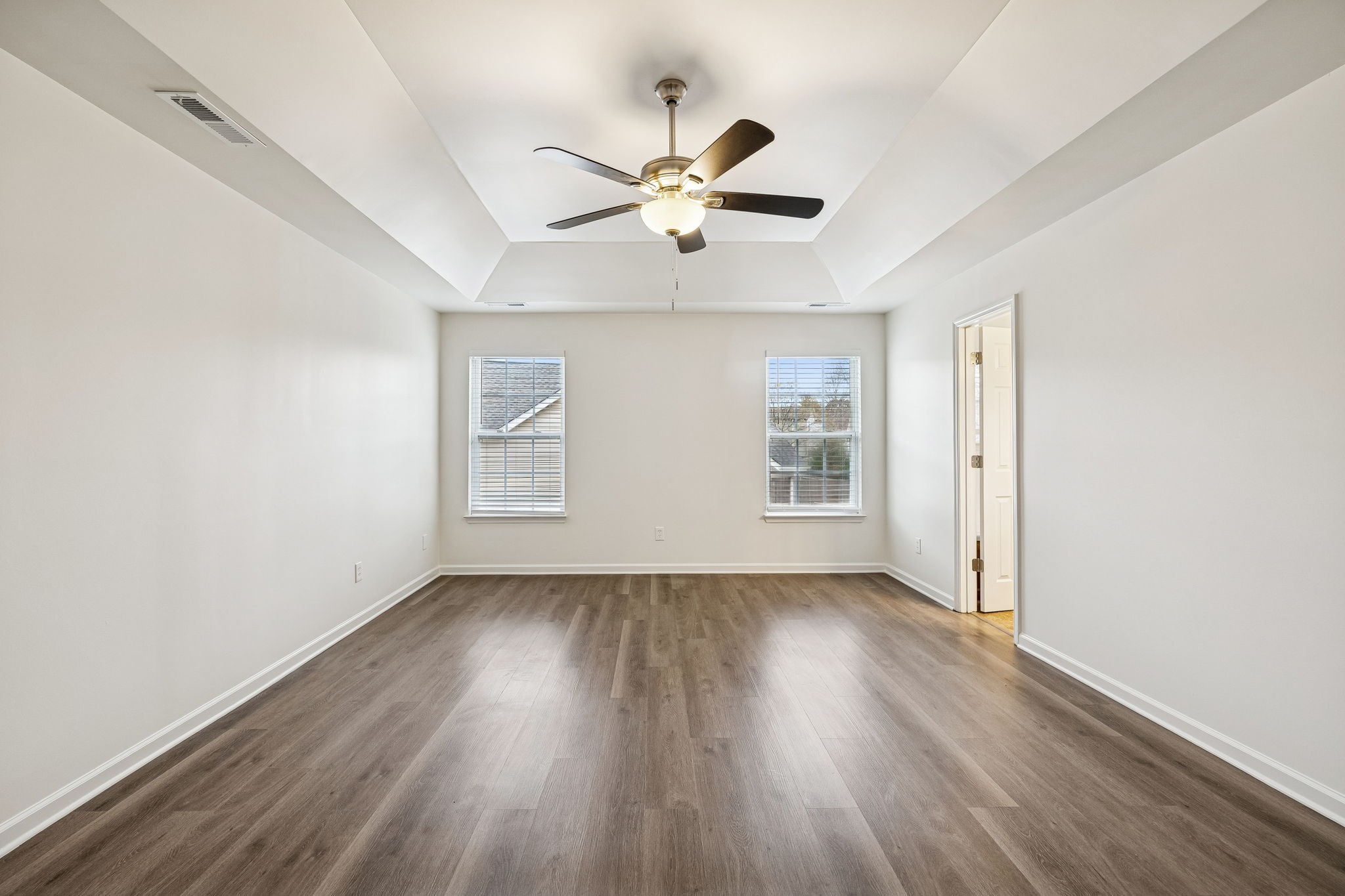 1849 Devon Drive Spring Hill, TN 37174 - Photo 42 of 58 a view of an empty room with wooden floor and a window