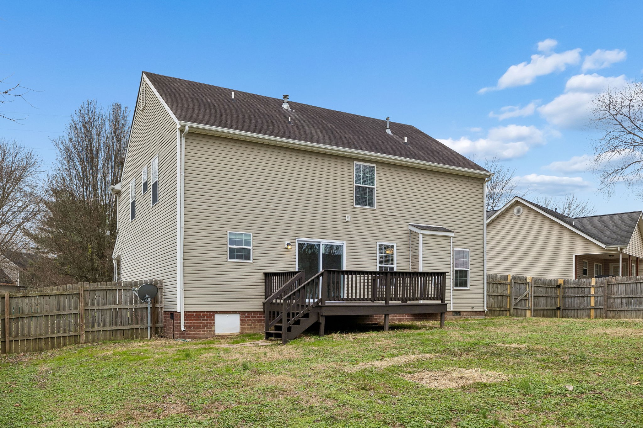 1849 Devon Drive Spring Hill, TN 37174 - Photo 55 of 58 a backyard of a house with barbeque oven and outdoor seating