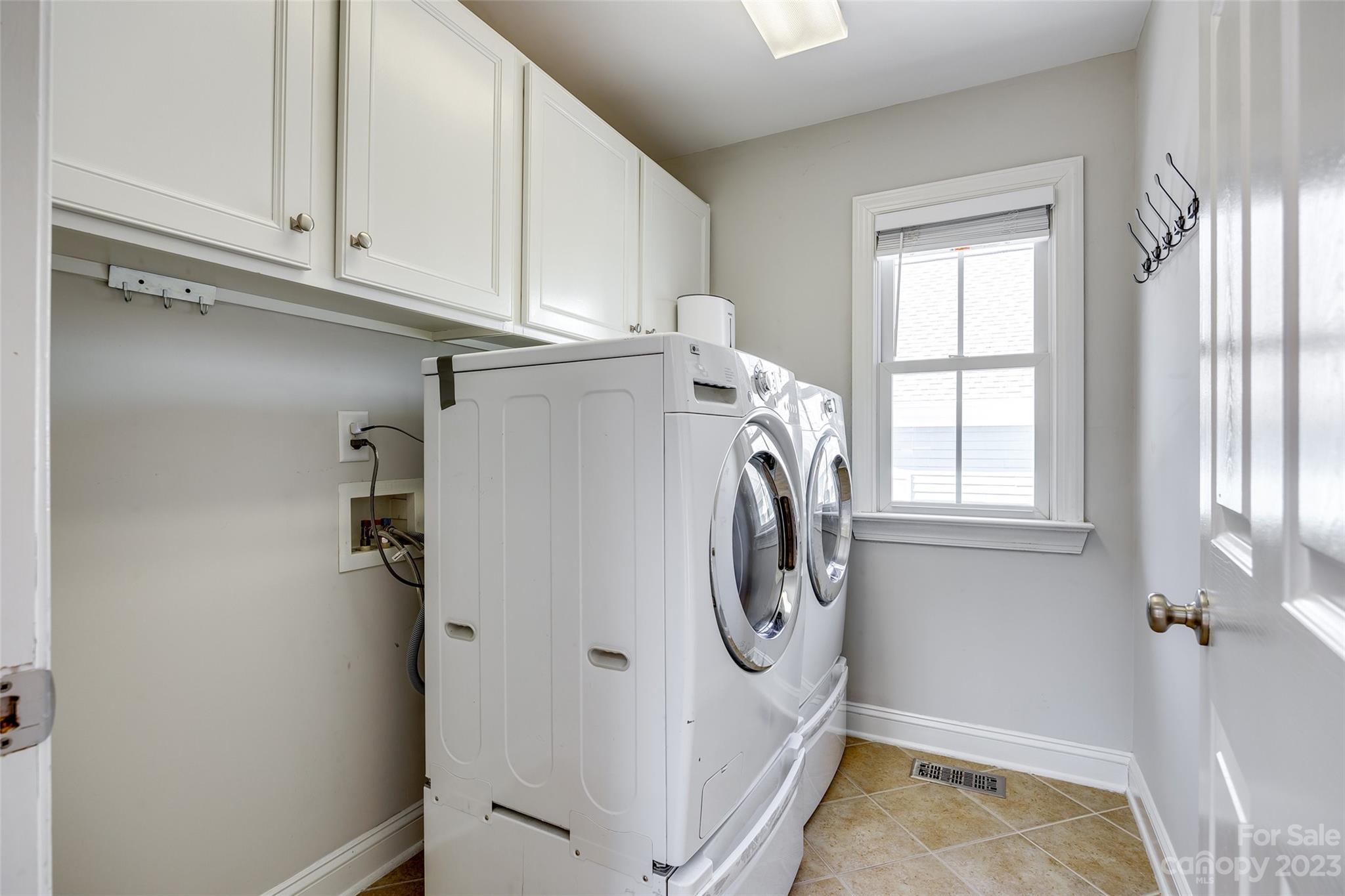 109 Mills Lane Fort Mill, SC 29708 - Photo 20 of 48 a utility room with dryer and washer