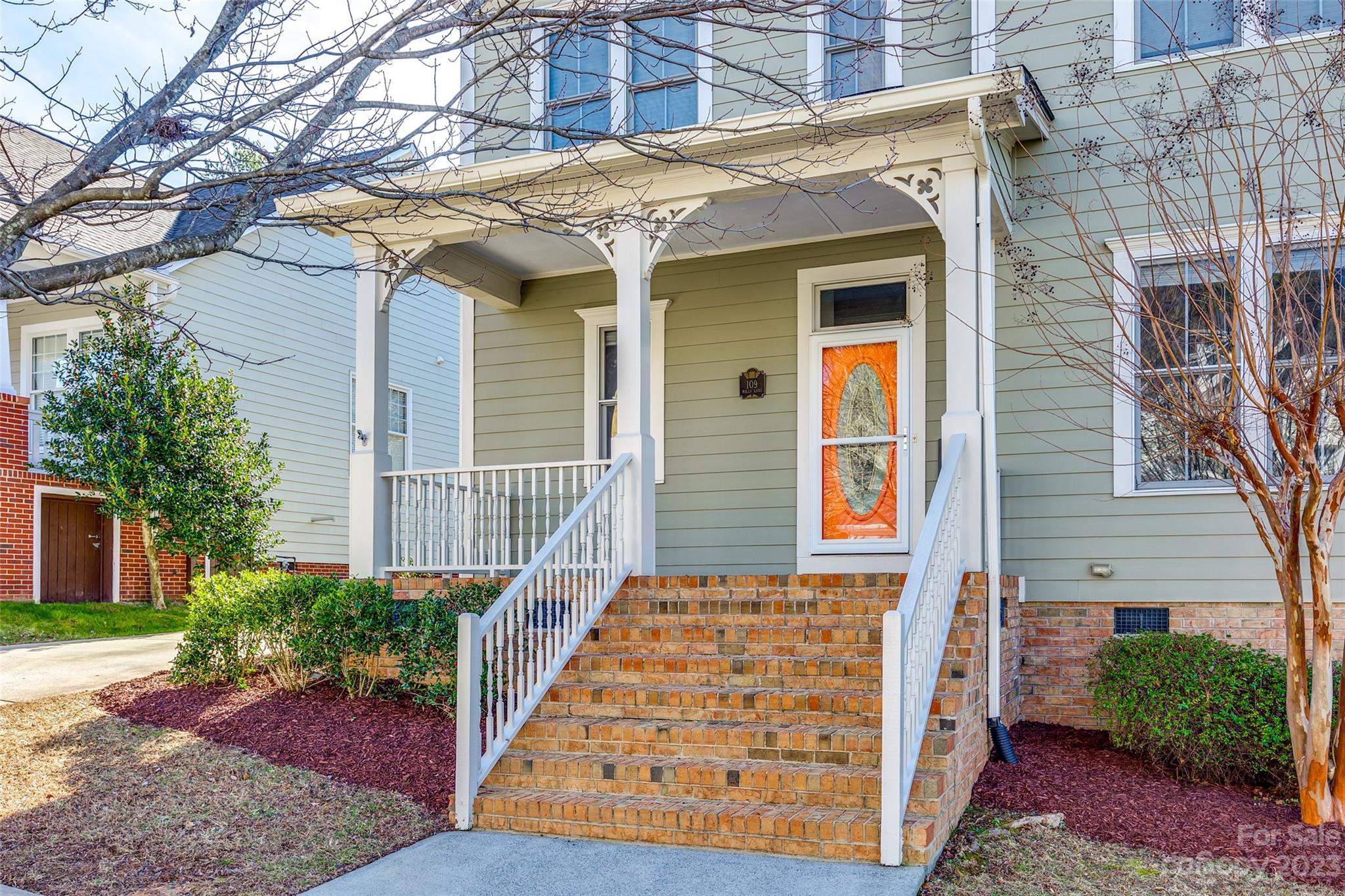 109 Mills Lane Fort Mill, SC 29708 - Photo 2 of 48 a front view of a house with a yard