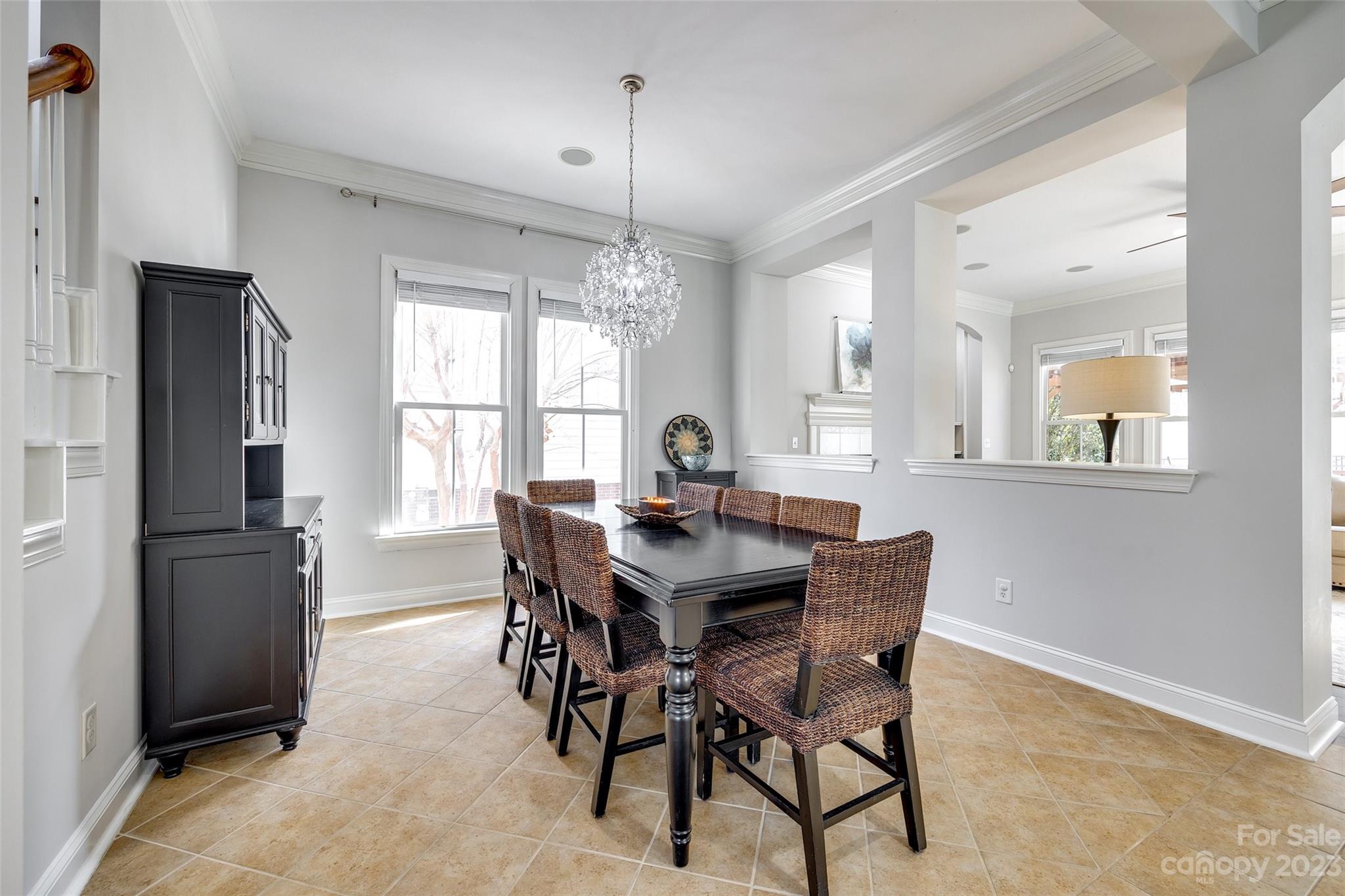 109 Mills Lane Fort Mill, SC 29708 - Photo 10 of 48 a view of a dining room with furniture window and wooden floor