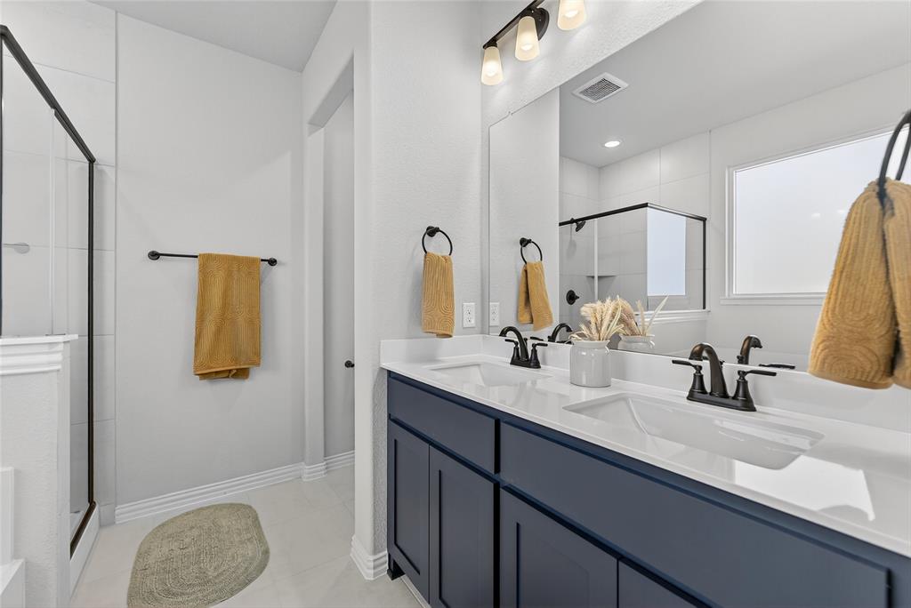 400 Hayden Faith Court Springtown, TX 76082 - Photo 24 of 35 Bathroom with a stall shower and double vanity