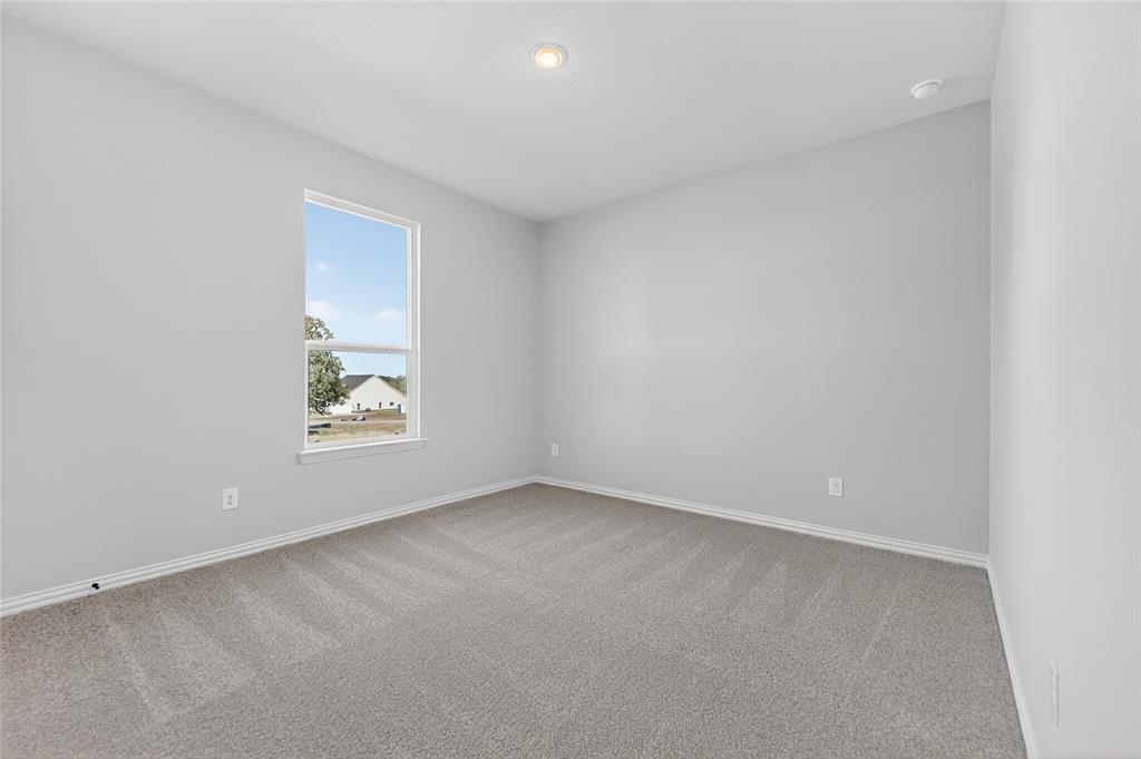 400 Hayden Faith Court Springtown, TX 76082 - Photo 28 of 35 an empty room with windows