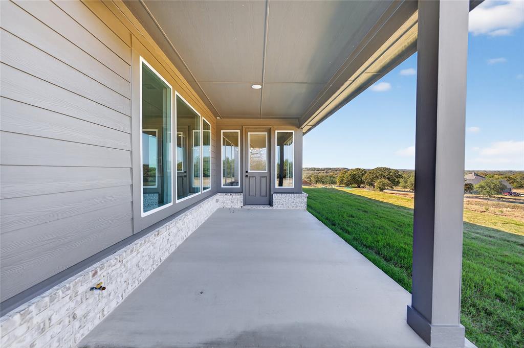400 Hayden Faith Court Springtown, TX 76082 - Photo 30 of 35 a view of a porch and garden