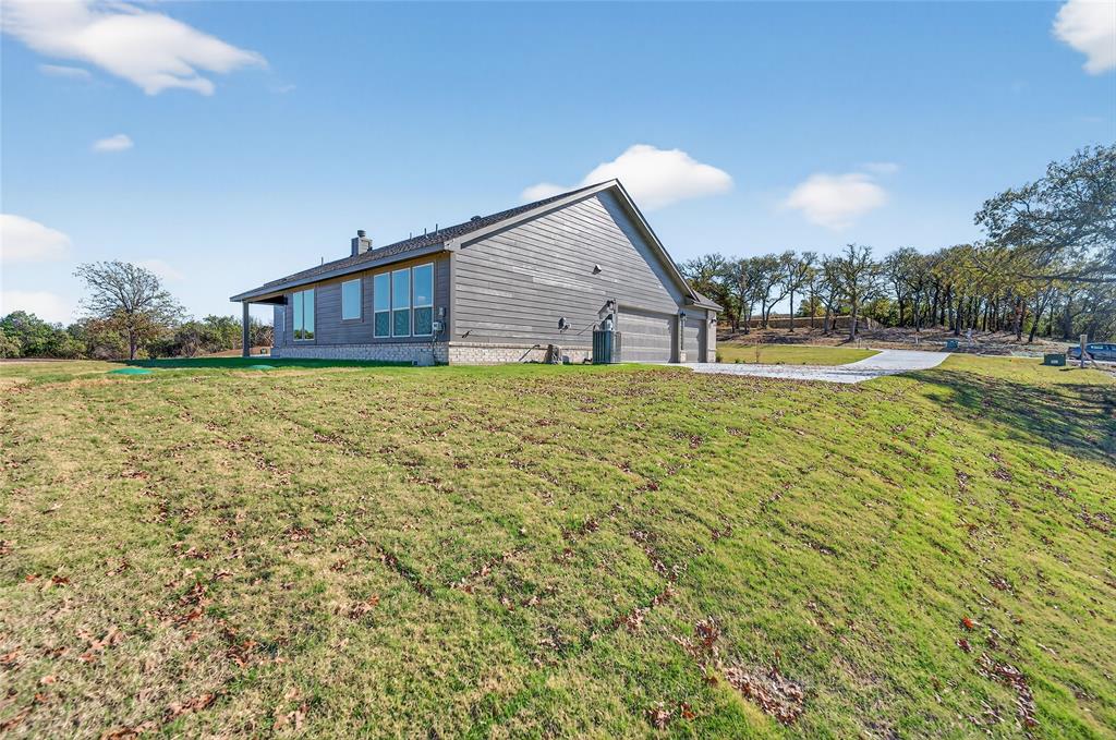 400 Hayden Faith Court Springtown, TX 76082 - Photo 33 of 35 a bathroom with a sink and a yard