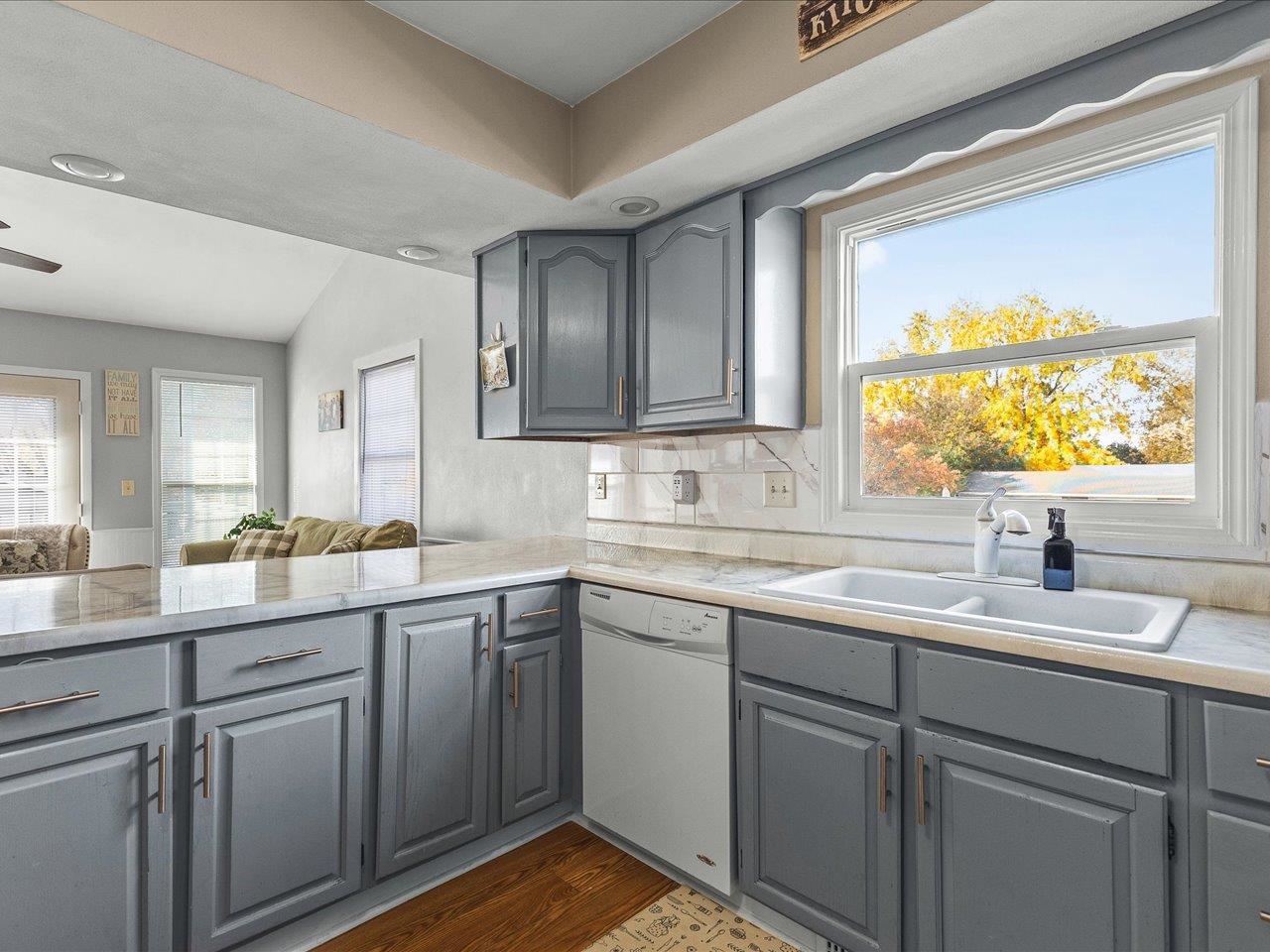 1919 Tomahawk Court Freeport, IL 61032 - Photo 12 of 39 a kitchen with a sink stove and cabinets