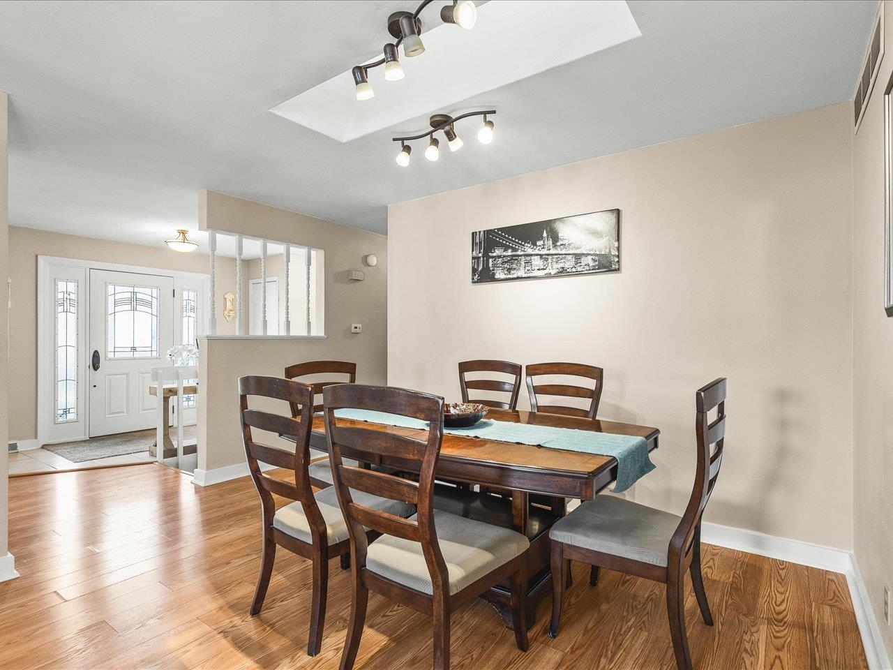 1919 Tomahawk Court Freeport, IL 61032 - Photo 15 of 39 a view of a dining room with furniture and wooden floor