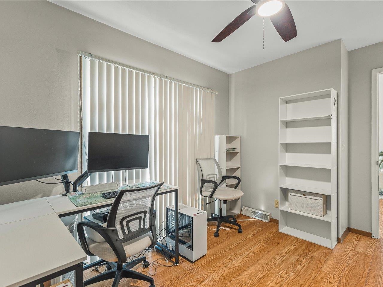 1919 Tomahawk Court Freeport, IL 61032 - Photo 22 of 39 a view of a livingroom with workspace and a window