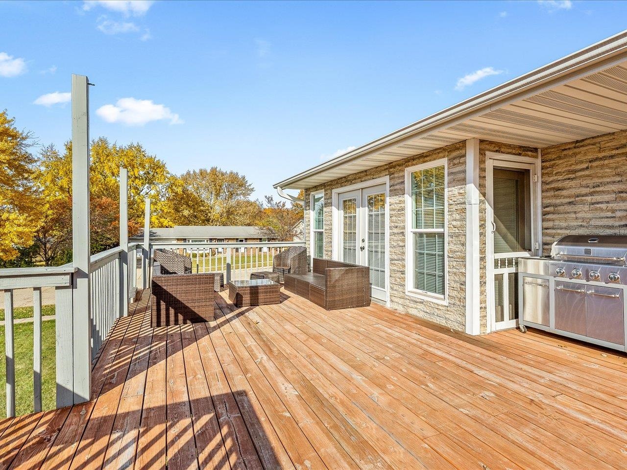 1919 Tomahawk Court Freeport, IL 61032 - Photo 34 of 39 a view of a balcony with wooden floor and outdoor seating