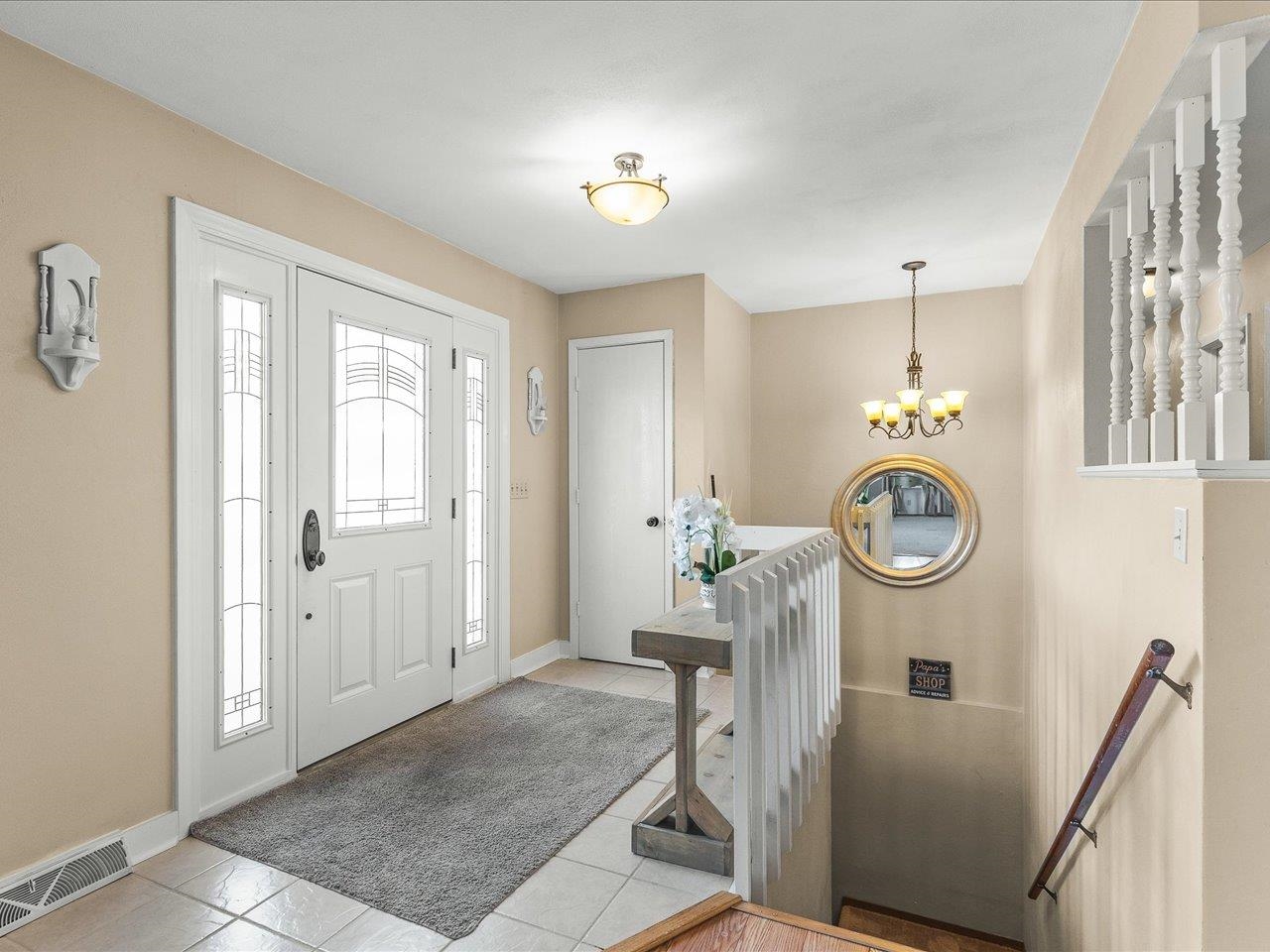 1919 Tomahawk Court Freeport, IL 61032 - Photo 4 of 39 a view of a hallway with washer and dryer