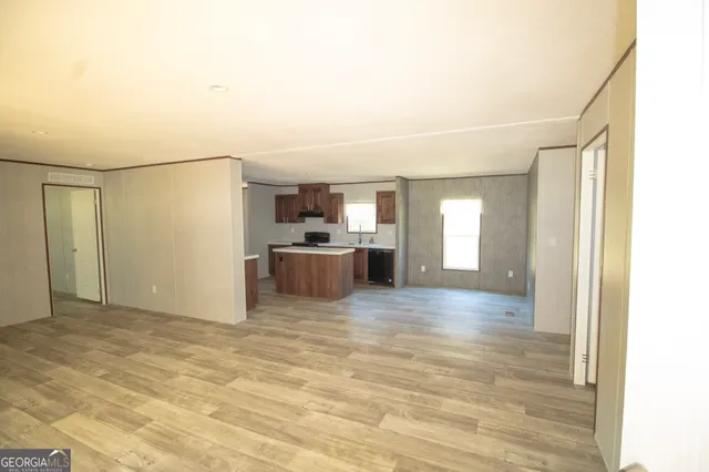 a view of a kitchen with a sink