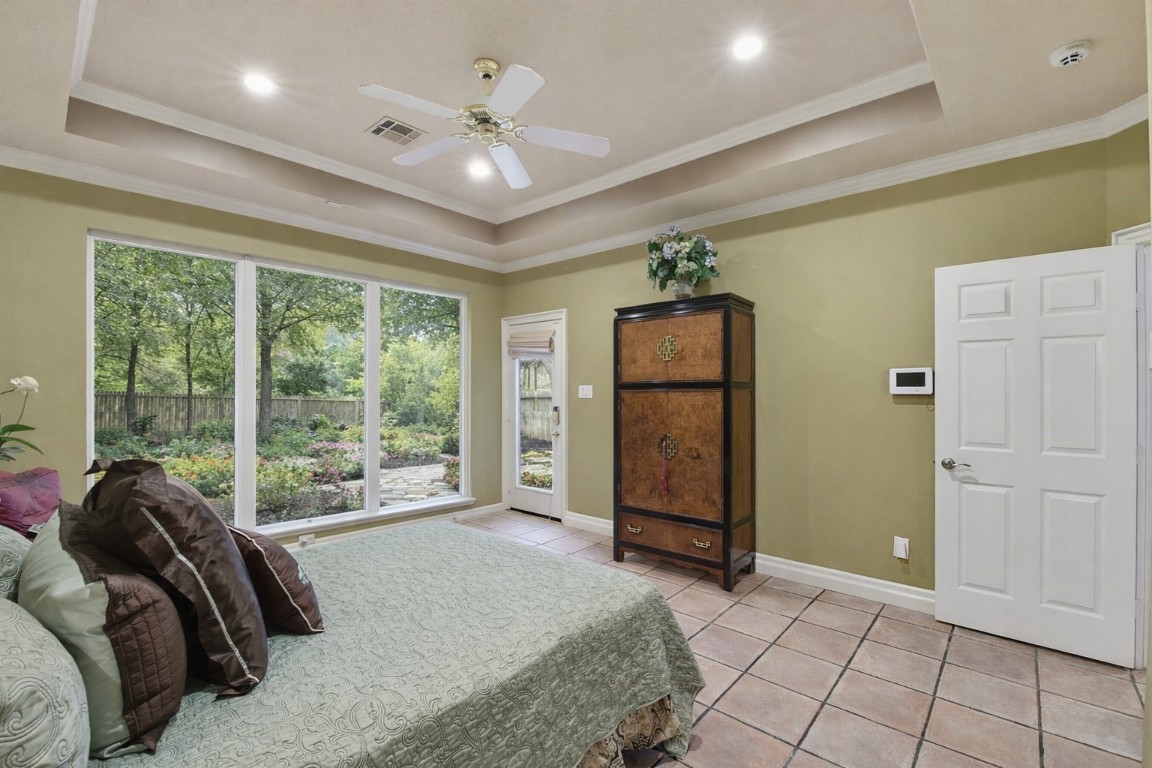 16322 Cranwood Drive Spring, TX 77379 - Photo 29 of 42 The Primary bedroom as a seperate exit to the back yard.