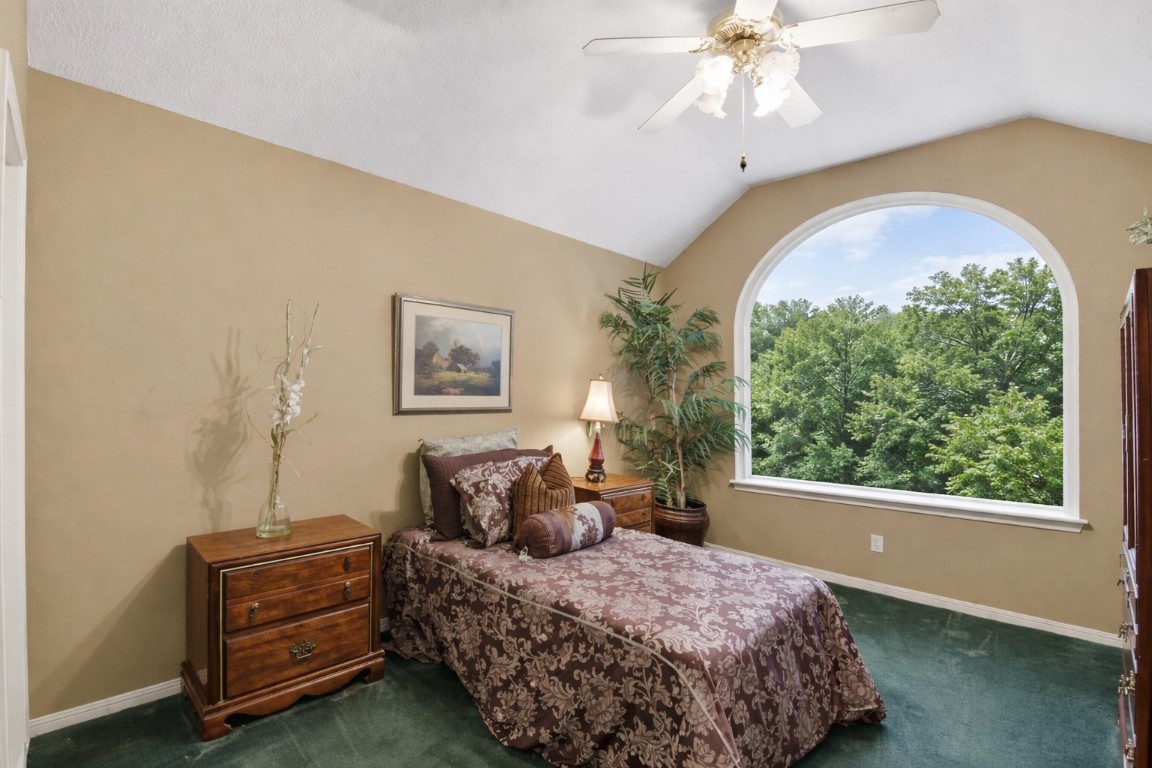 16322 Cranwood Drive Spring, TX 77379 - Photo 40 of 42 The second Bedroom has a beautiful arched window.