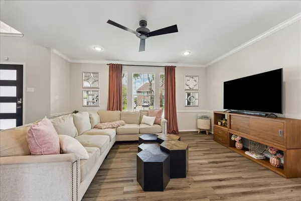 a living room with furniture and a window