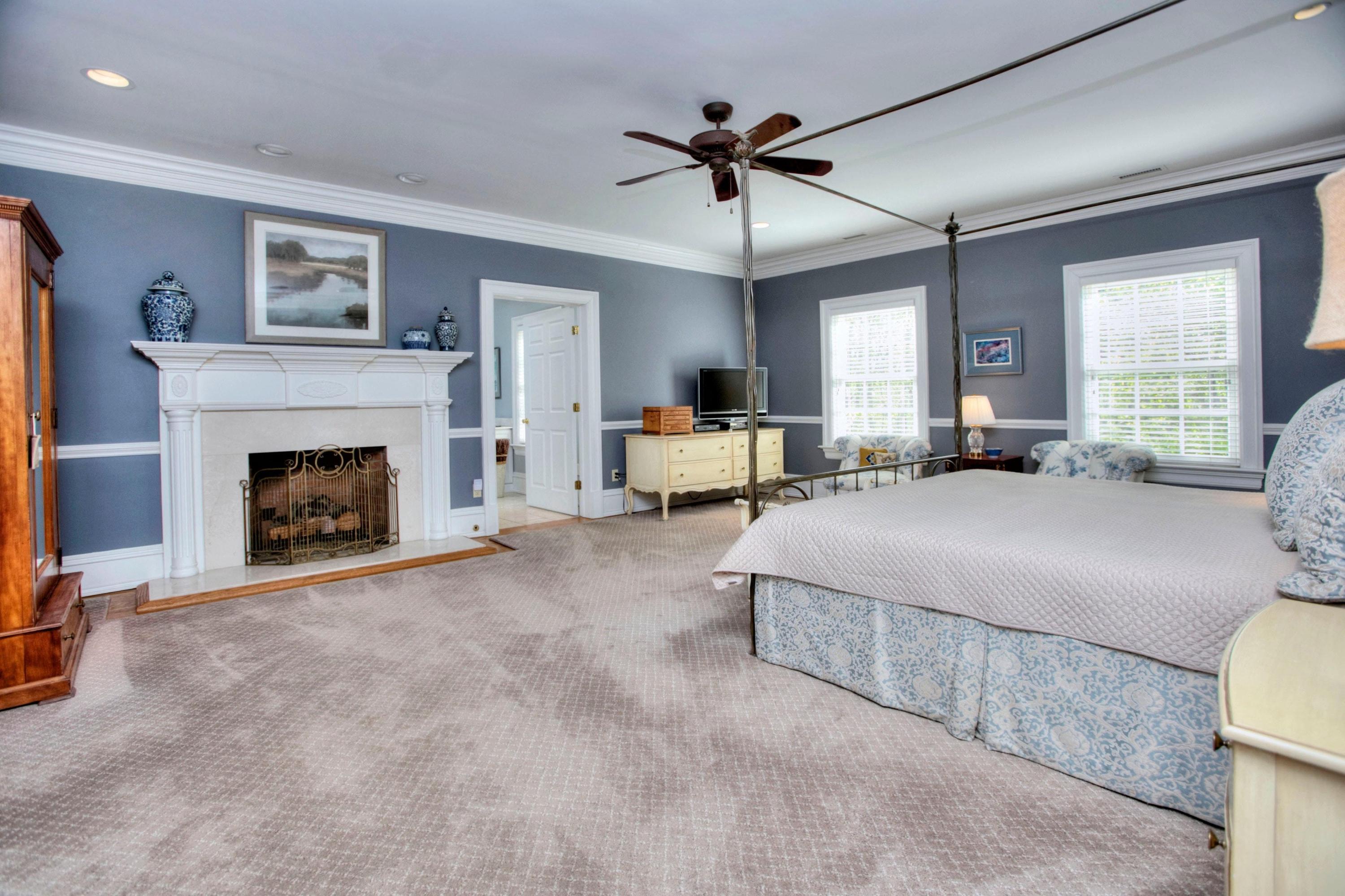 1325 Smith Ridge Road New Canaan, CT 06840 - Photo 14 of 28 a living room with furniture and a fireplace