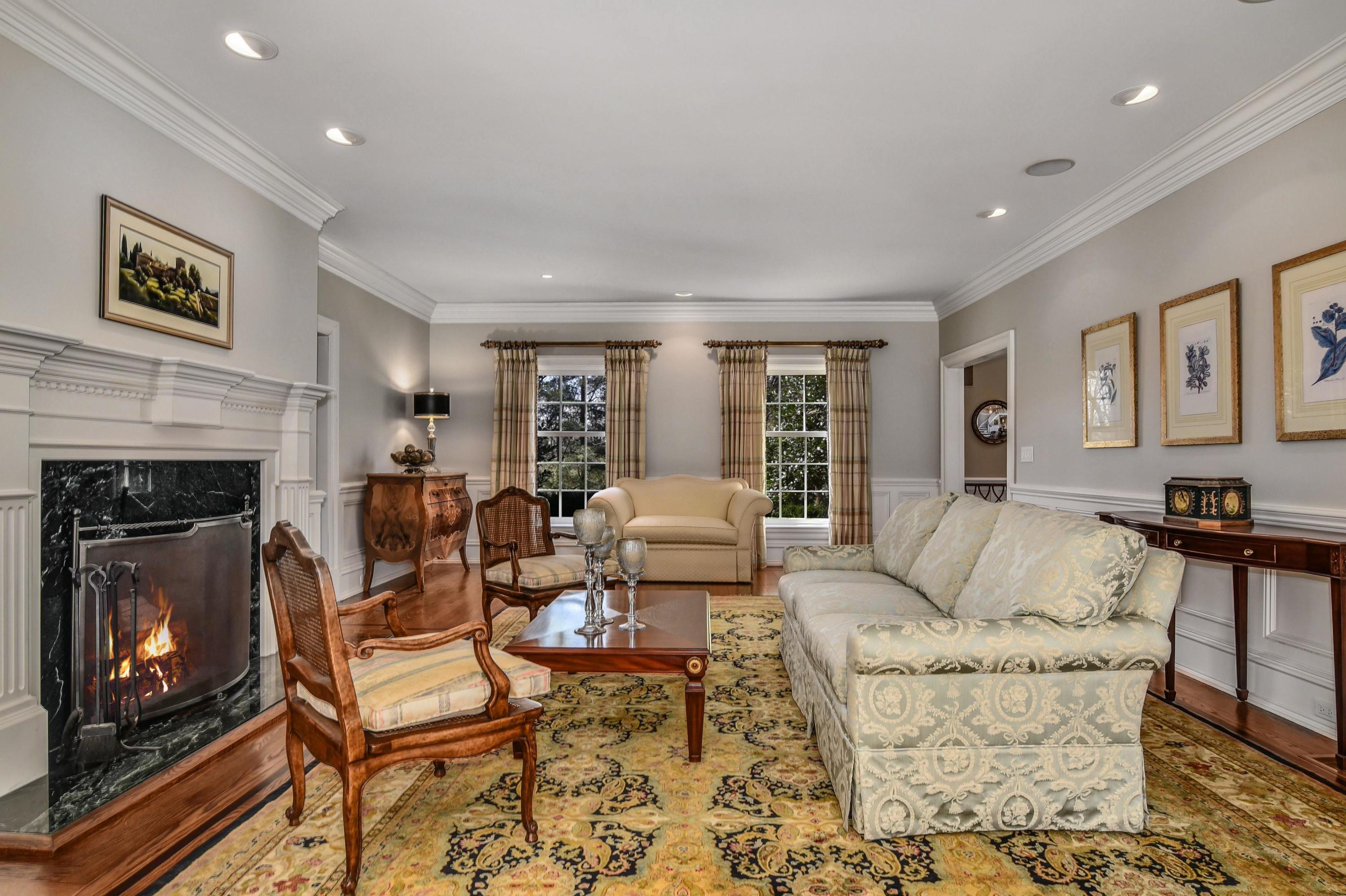 1325 Smith Ridge Road New Canaan, CT 06840 - Photo 5 of 28 a living room with fireplace furniture and a fireplace