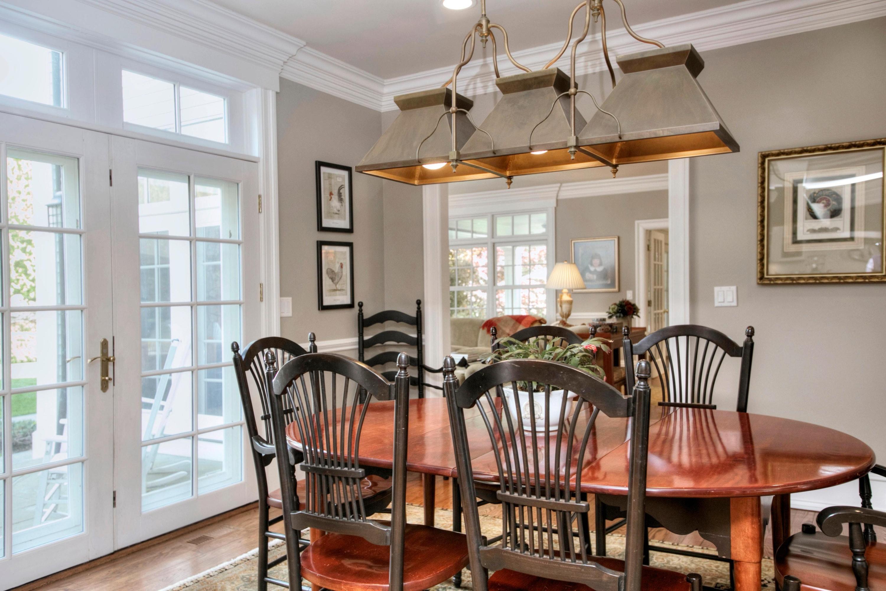 1325 Smith Ridge Road New Canaan, CT 06840 - Photo 7 of 28 a view of a dining room and furniture window and wooden floor
