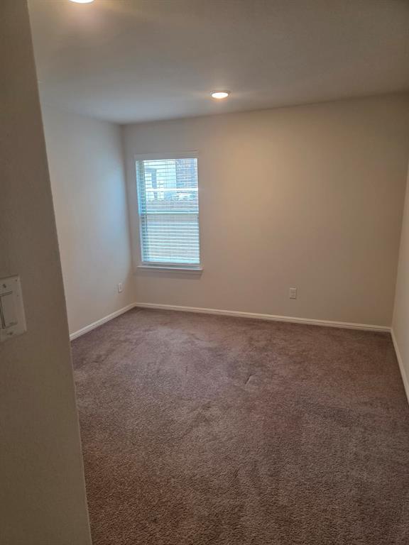 1512 Springtree Drive McKinney, TX 75071 - Photo 17 of 23 an empty room with a window