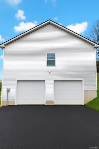 a view of outdoor space garage and window