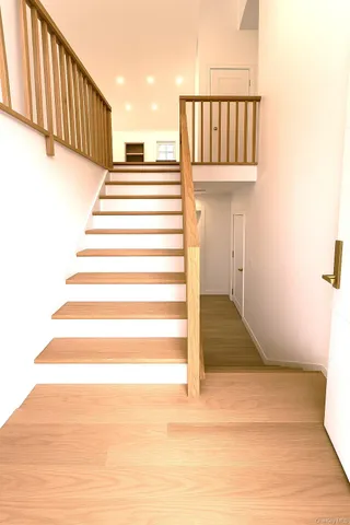 a view of entryway with wooden floor