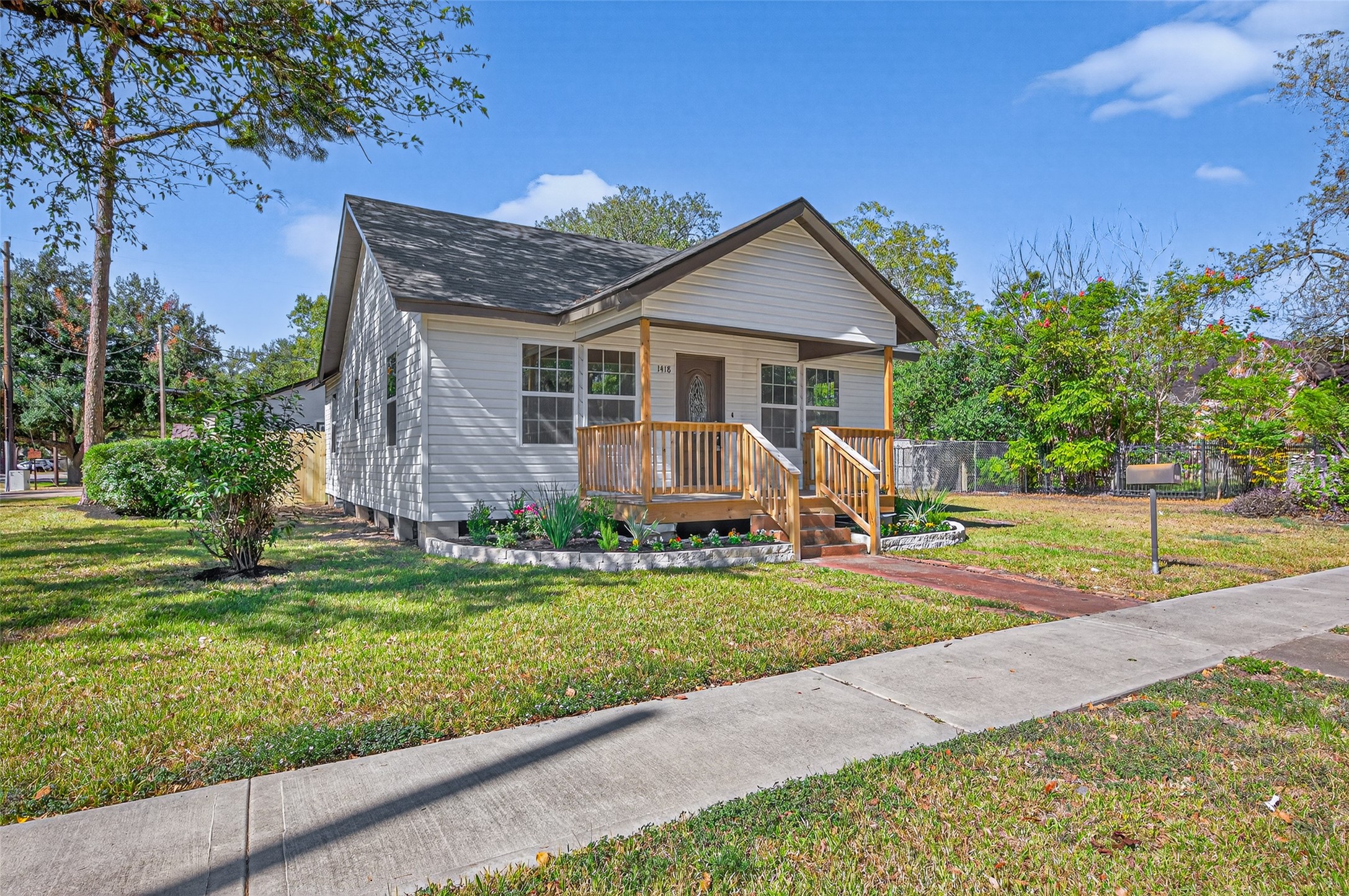 1418 Carlisle Street Rosenberg, TX 77471 - Photo 2 of 49 a view of a house with a yard