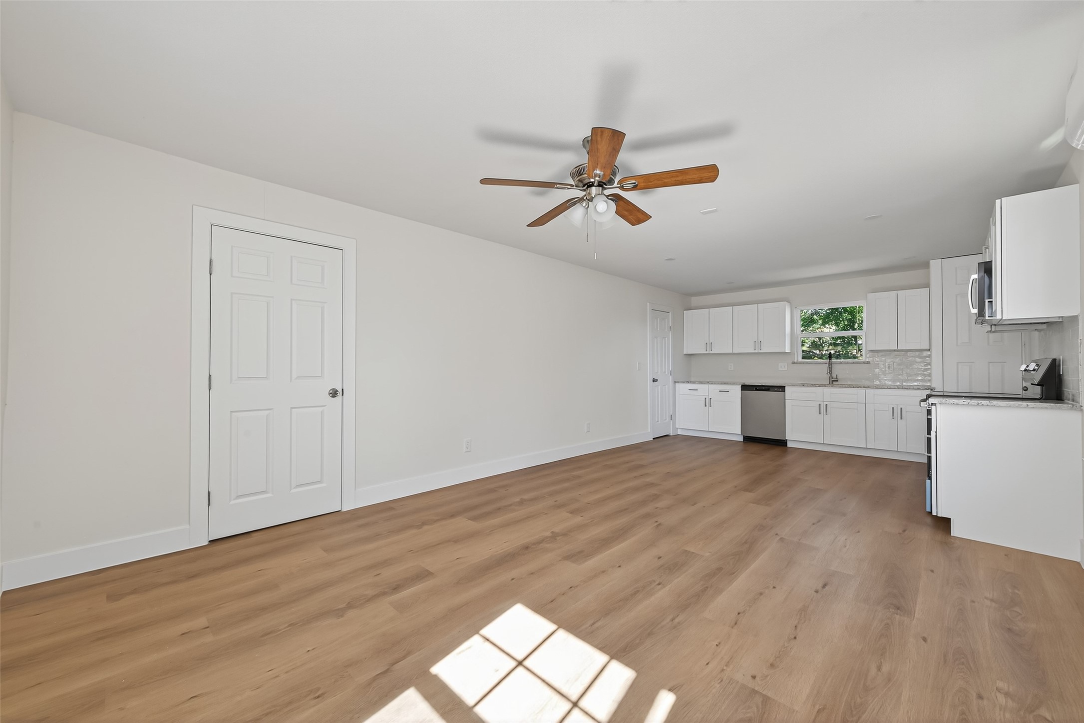 1418 Carlisle Street Rosenberg, TX 77471 - Photo 29 of 49 a view of empty room with wooden floor and ceiling fan