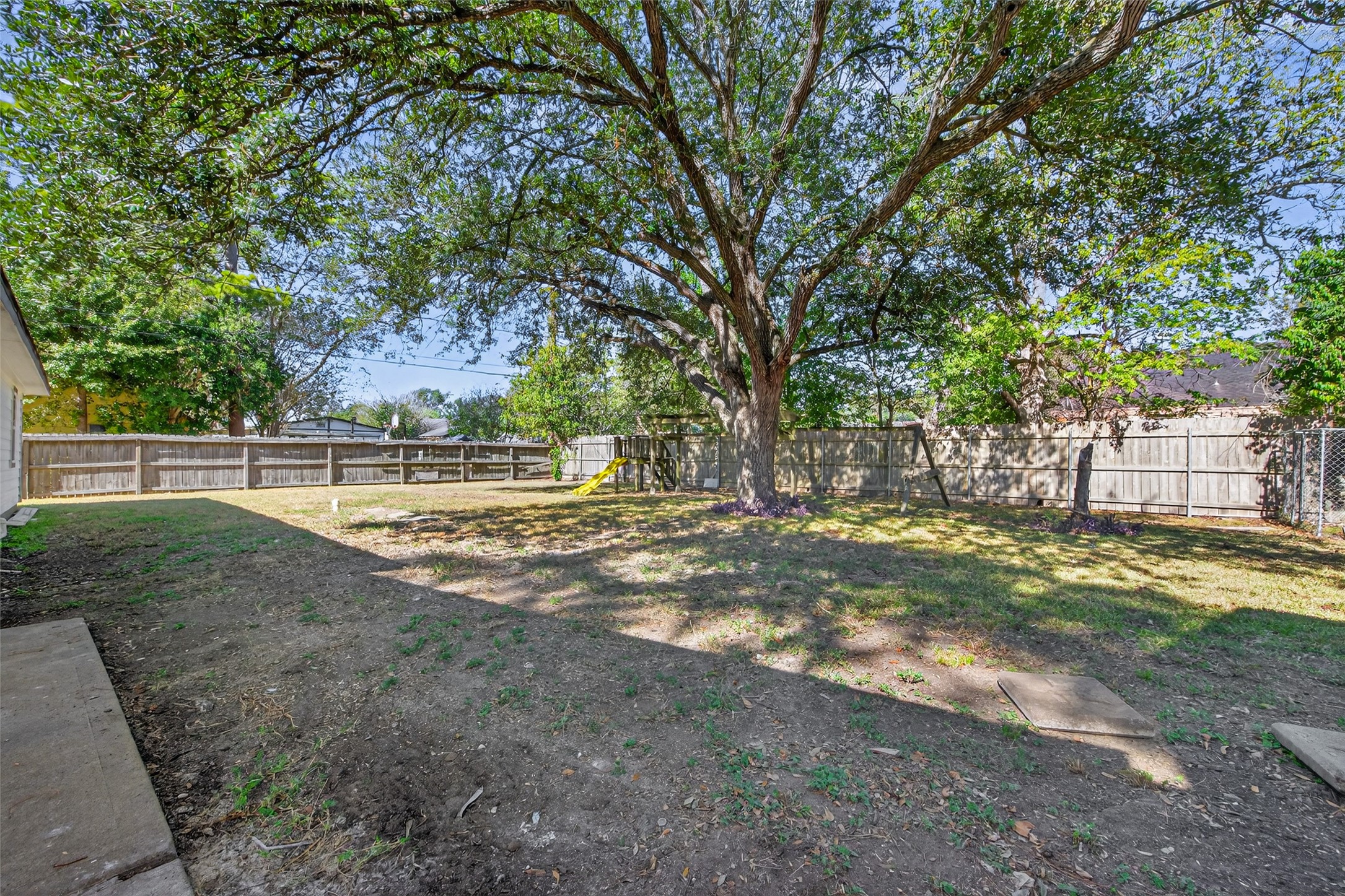 1418 Carlisle Street Rosenberg, TX 77471 - Photo 40 of 49 a view of a yard with large trees