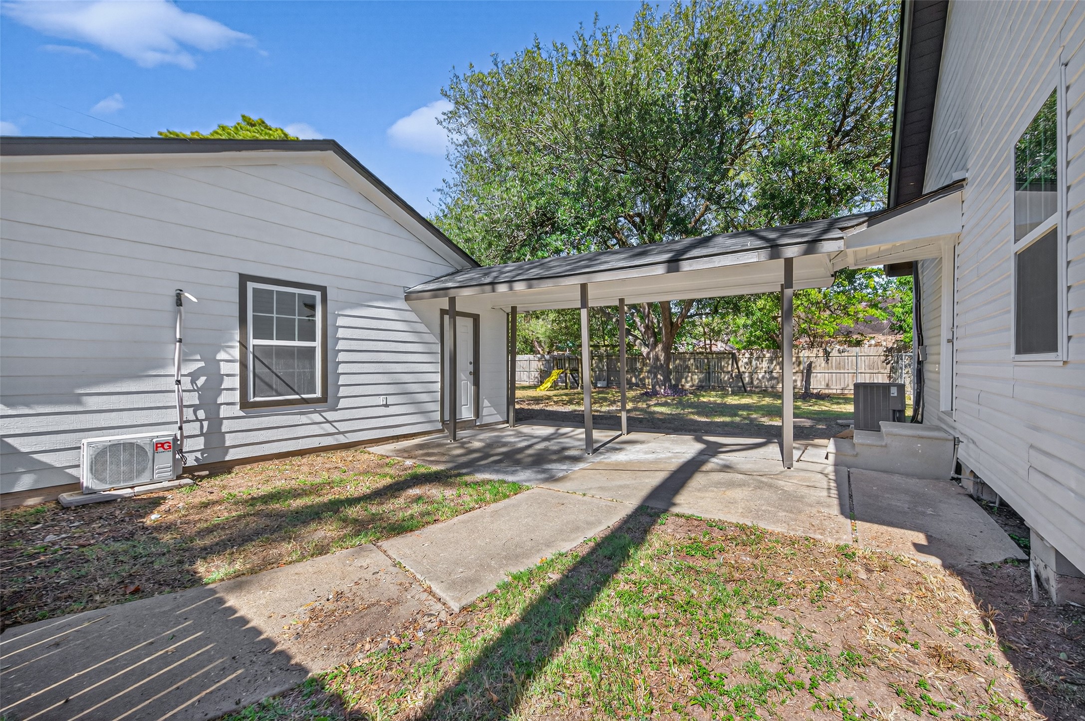 1418 Carlisle Street Rosenberg, TX 77471 - Photo 41 of 49 a view of a house with backyard and sitting area