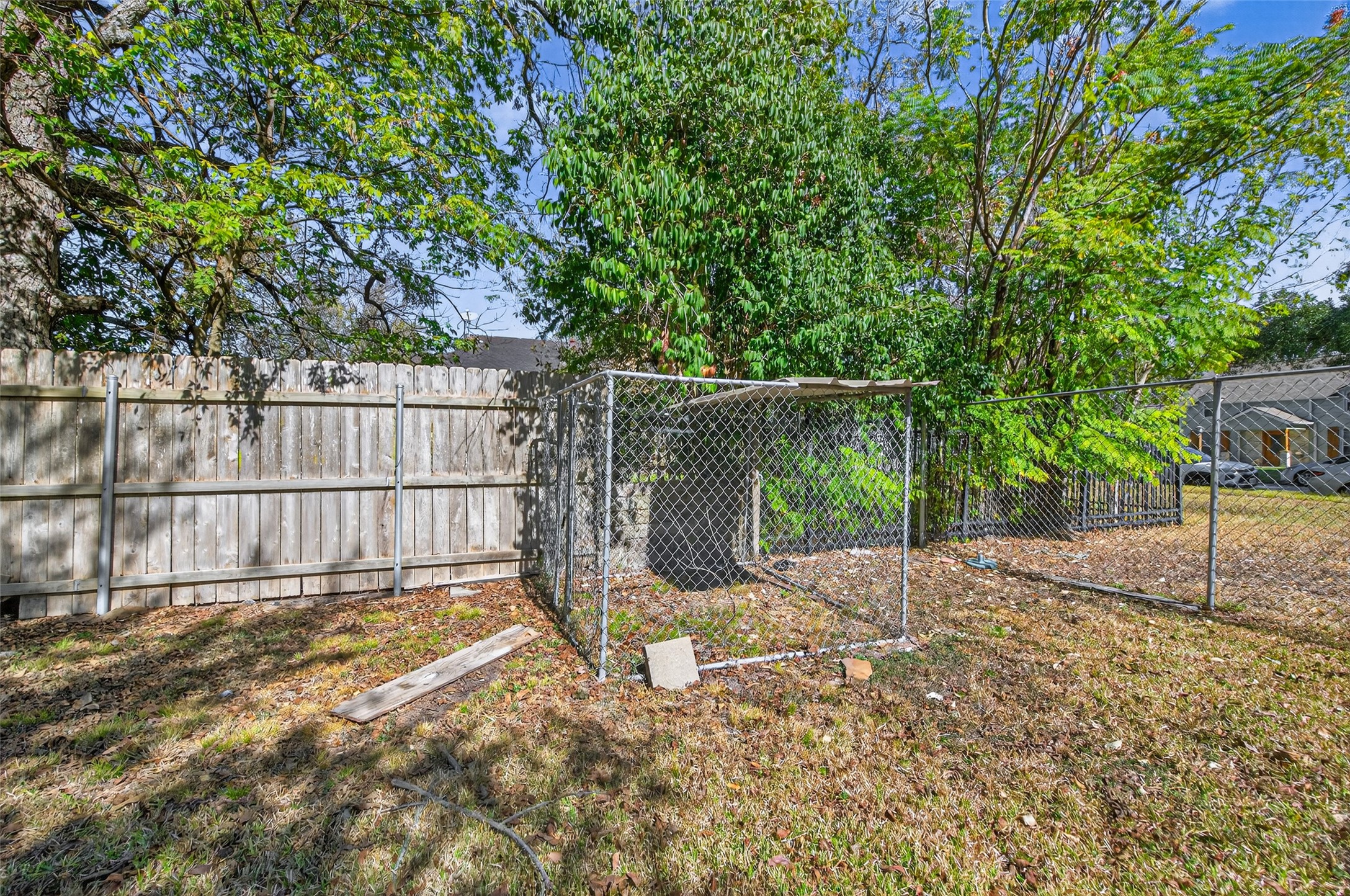 1418 Carlisle Street Rosenberg, TX 77471 - Photo 43 of 49 a view of a backyard with wooden fence