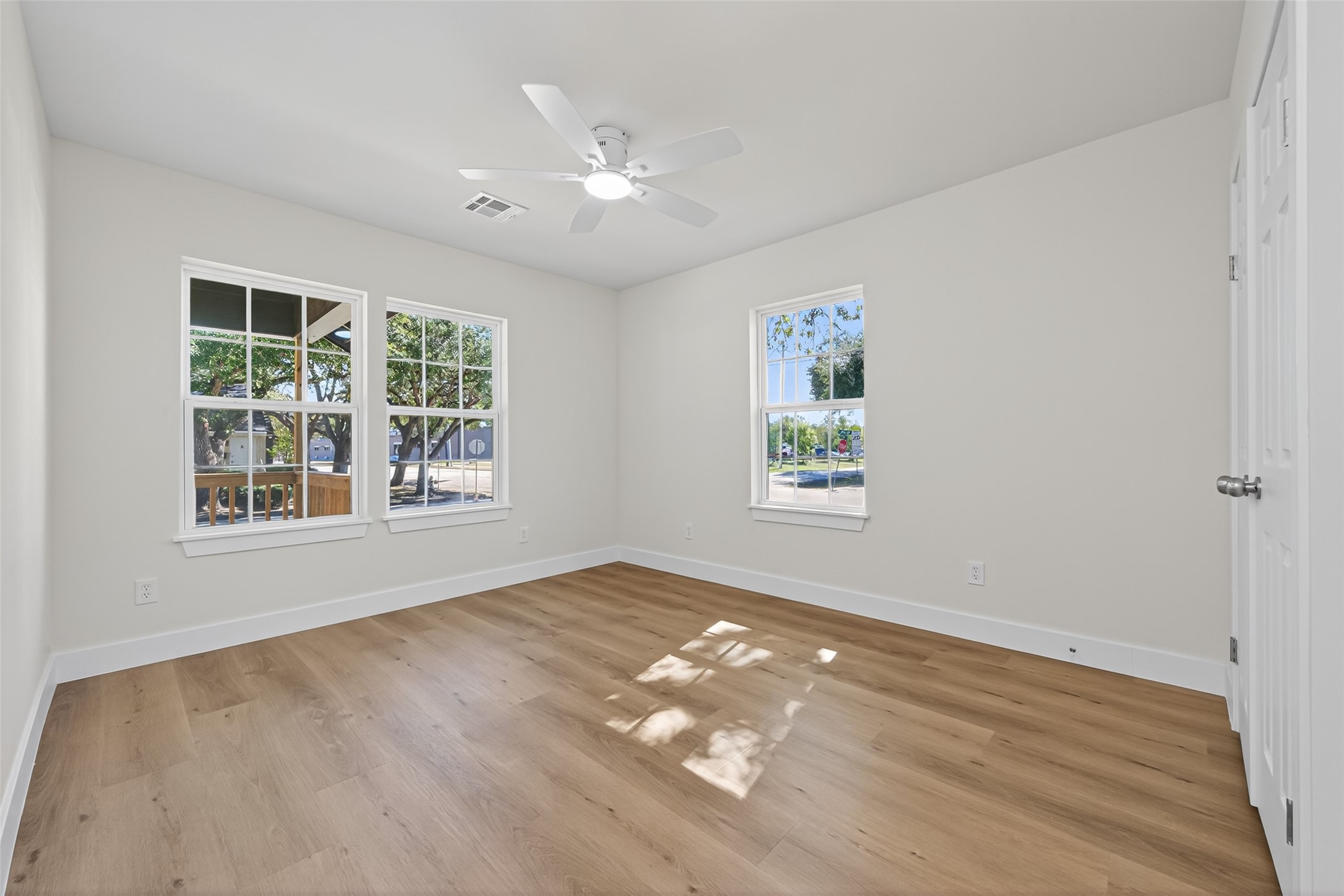 1418 Carlisle Street Rosenberg, TX 77471 - Photo 8 of 49 wooden floor in an empty room with a window