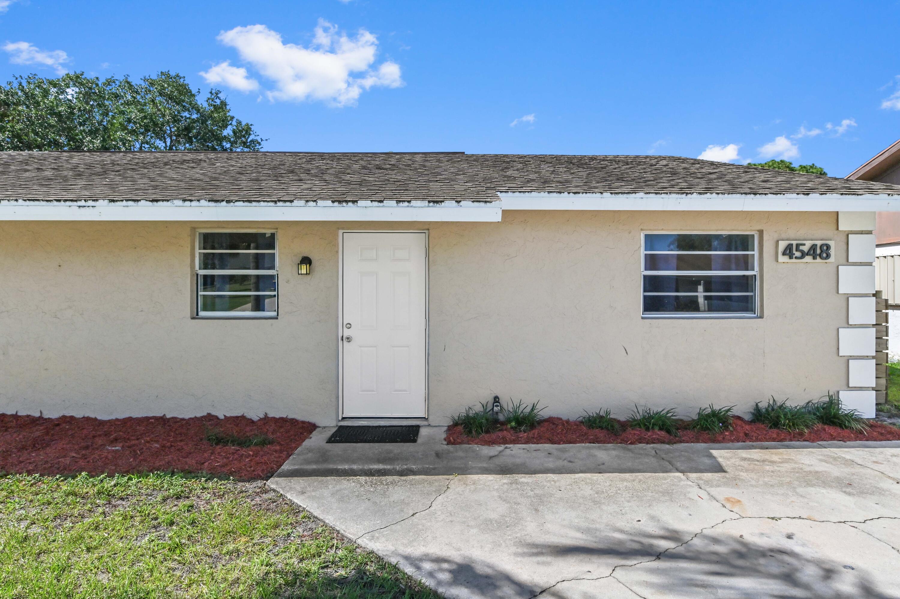 4548 Southeast Salvatori Road Stuart, FL 34997 - Photo 2 of 30 01 front 01
