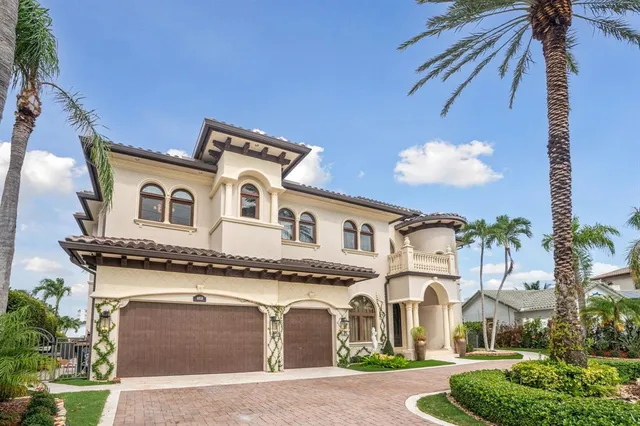 a view of hall with wooden floor and a fireplace