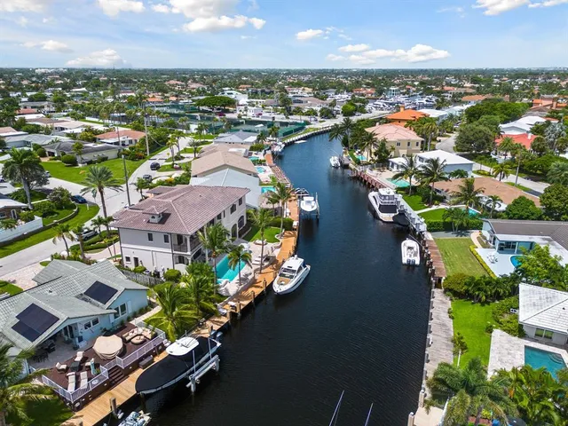 a view of a dining room with furniture and window