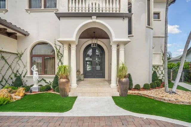 a kitchen with sink and cabinets