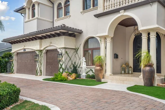 a room with lots of appliances and cabinets