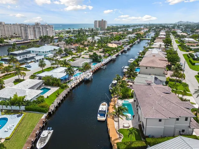a view of a chairs and tables in the balcony