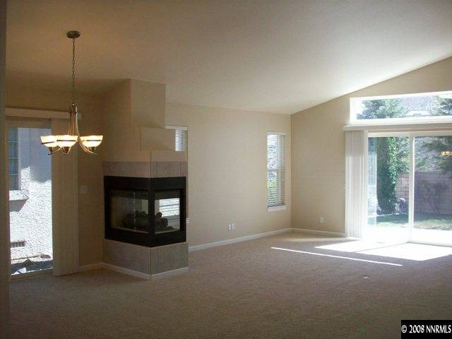 2460 Granite Springs Road Reno, NV 89519 - Photo 3 of 9 a view of a livingroom with a fireplace