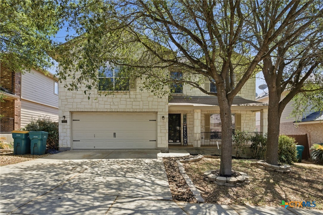 a house with trees in front of it